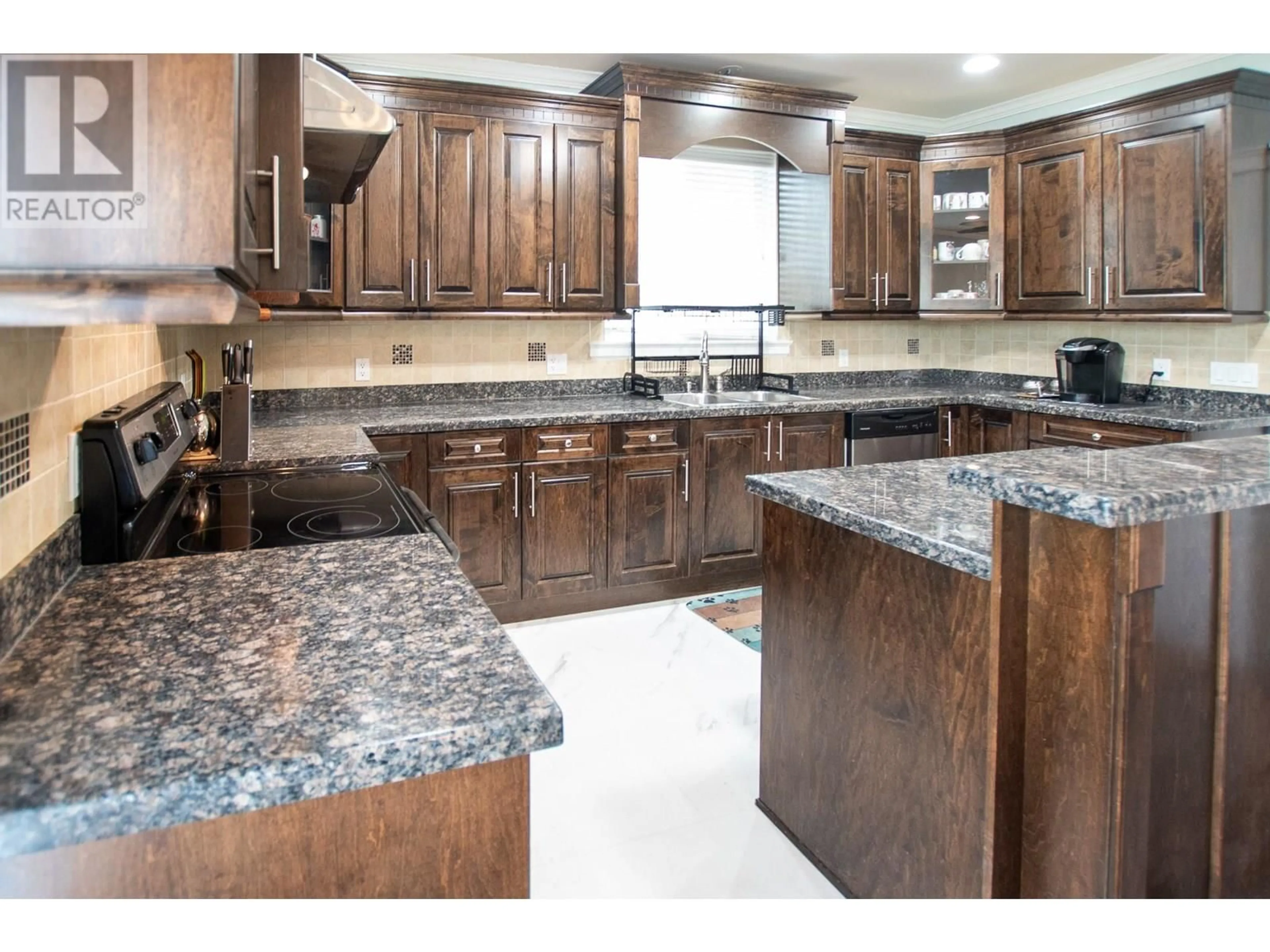 Open concept kitchen, ceramic/tile floor for 1890B SAGE STREET, Merritt British Columbia V1K1G3