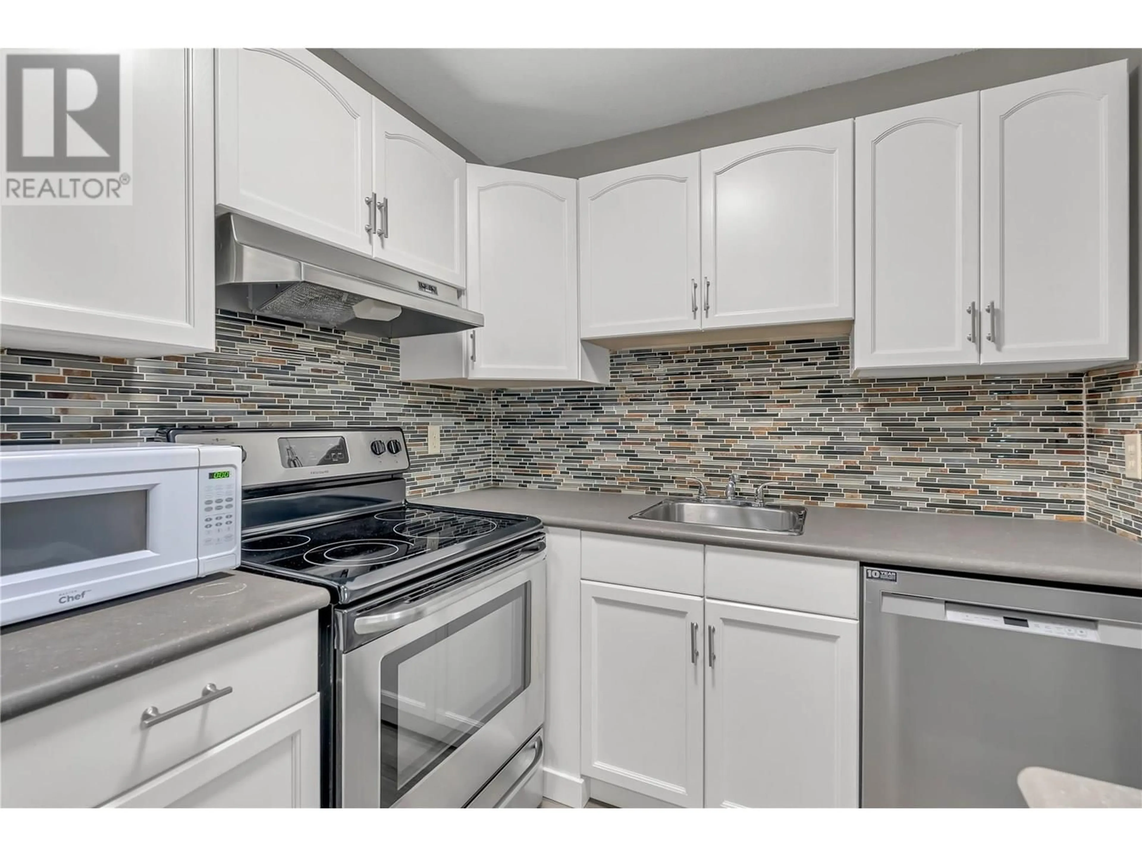 Standard kitchen, ceramic/tile floor for 207C - 735 COOK ROAD, Kelowna British Columbia V1W3G6