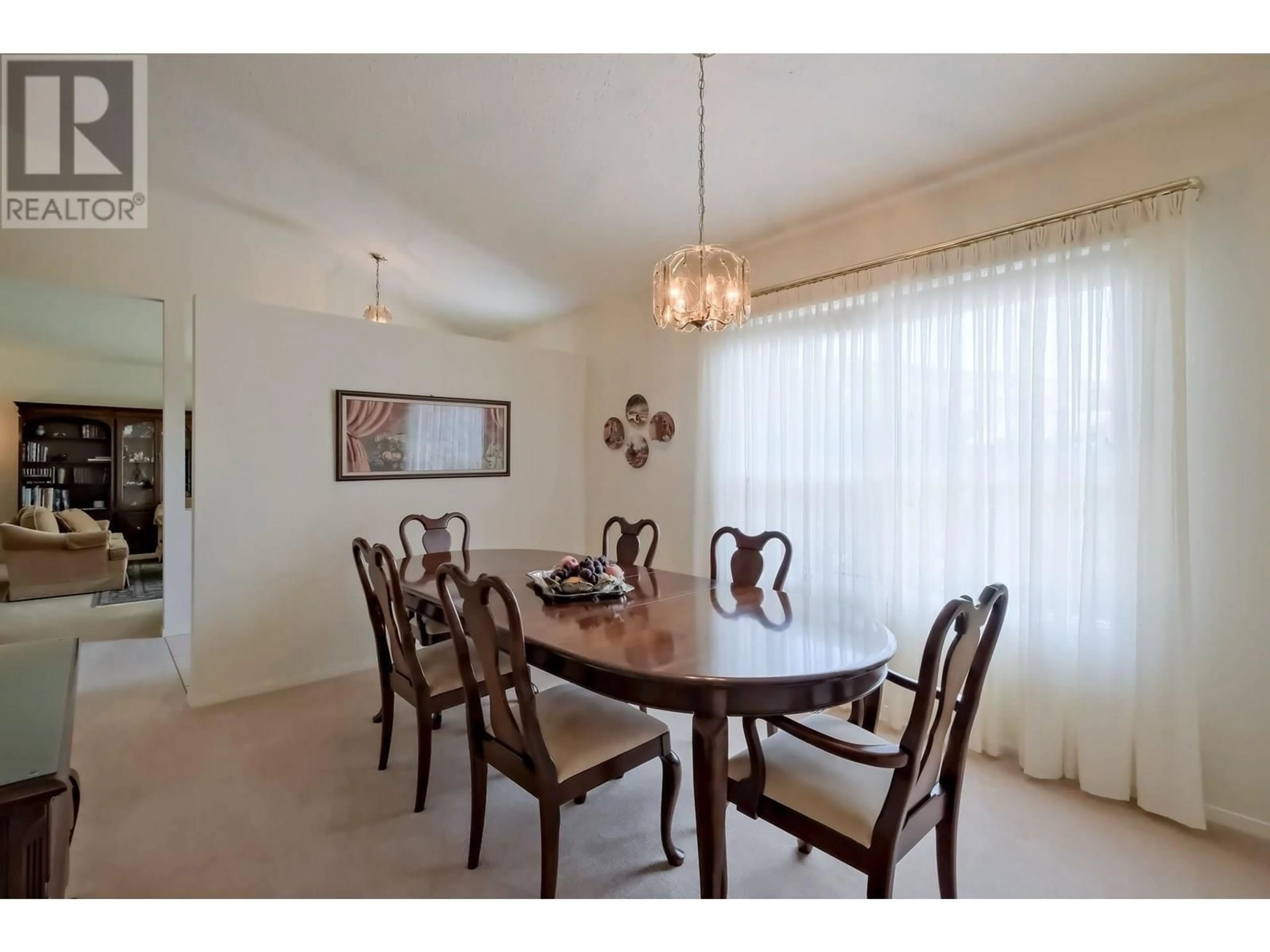 Dining room, wood/laminate floor for 174 DAFOE PLACE, Penticton British Columbia V2A7E6