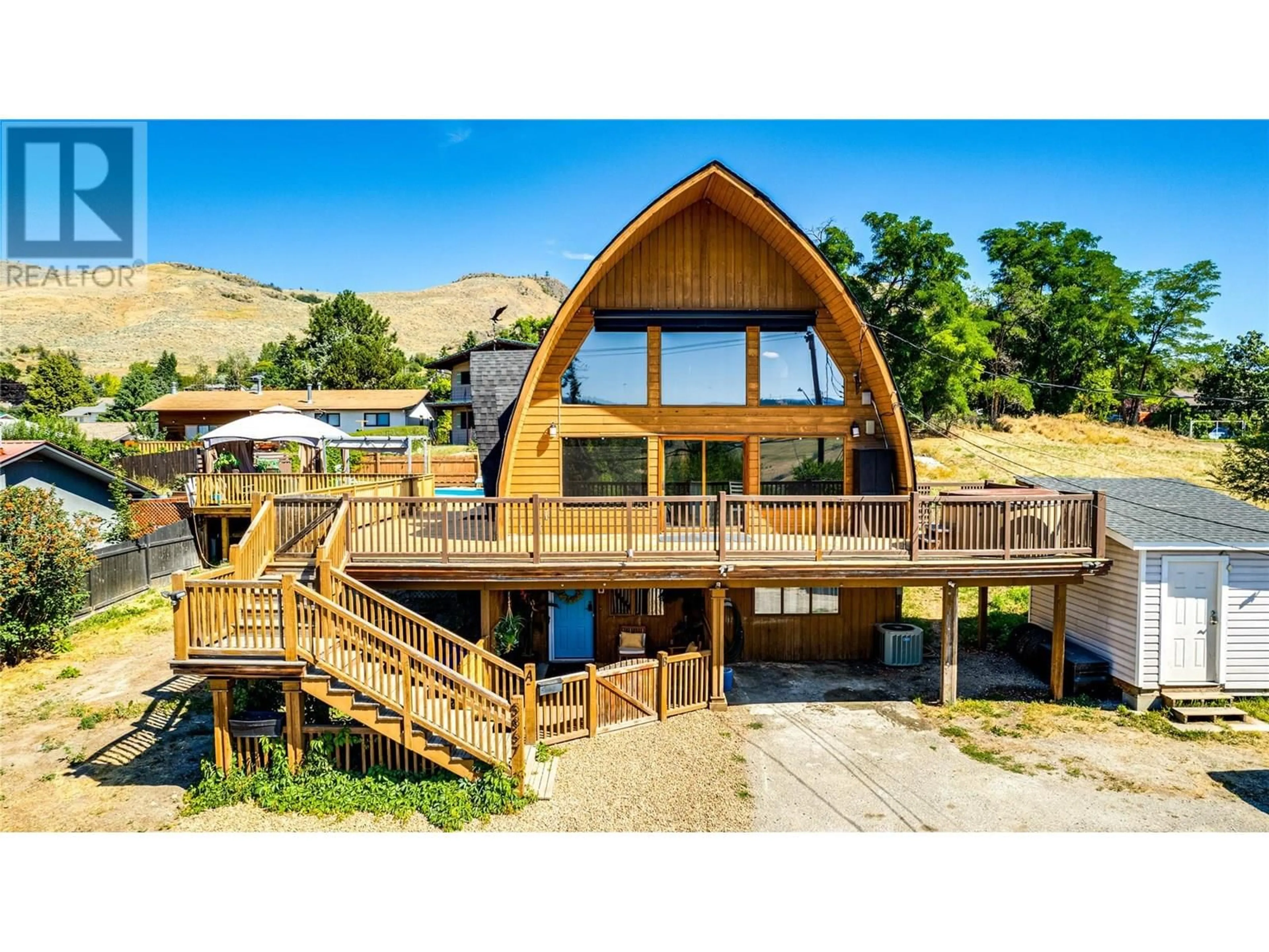A pic from outside/outdoor area/front of a property/back of a property/a pic from drone, mountain view for 5867 BELLA VISTA ROAD, Vernon British Columbia V1H1B1