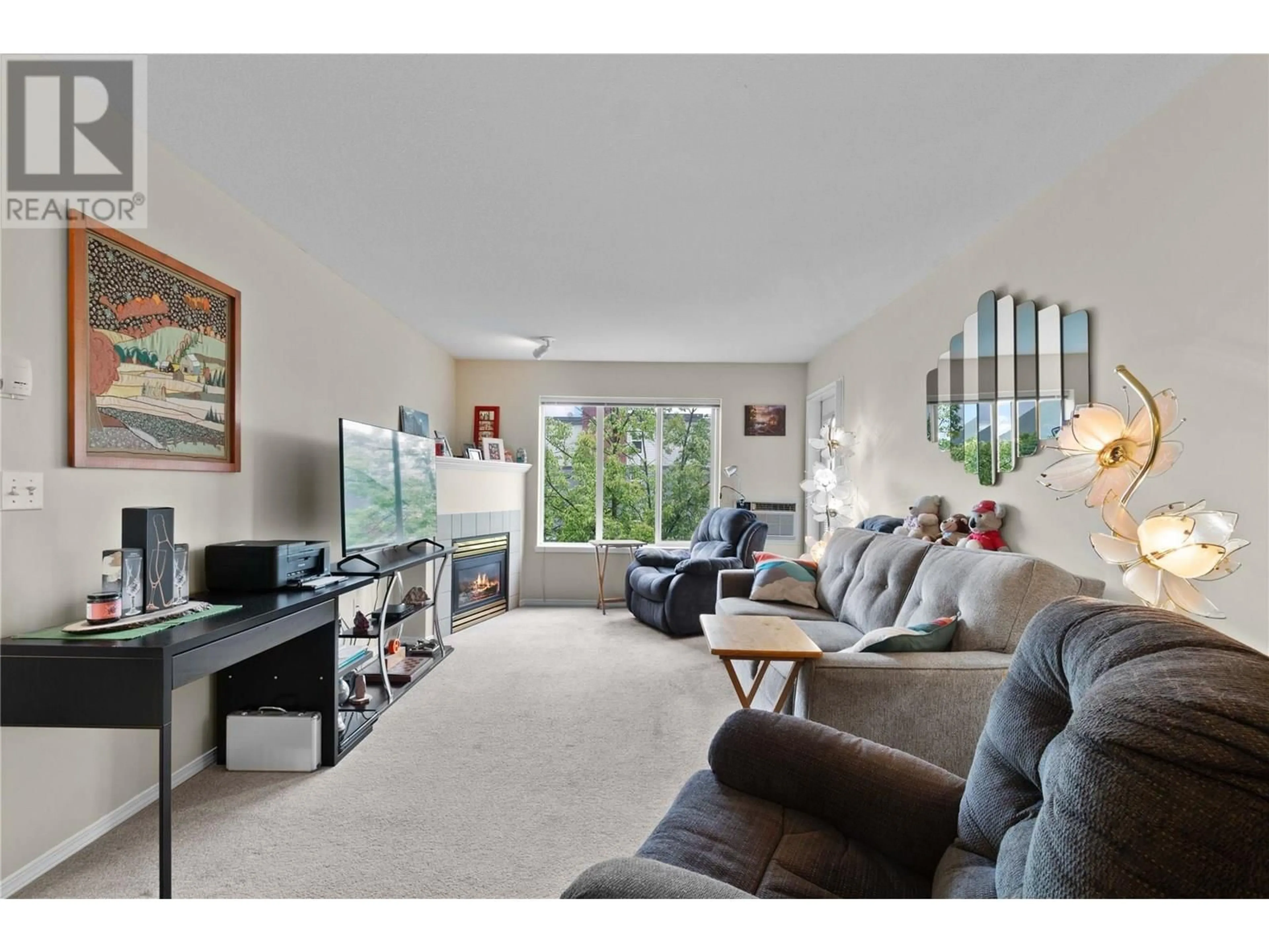 Living room with furniture, unknown for 407 - 640 3 STREET SOUTHWEST, Salmon Arm British Columbia V1E2R3