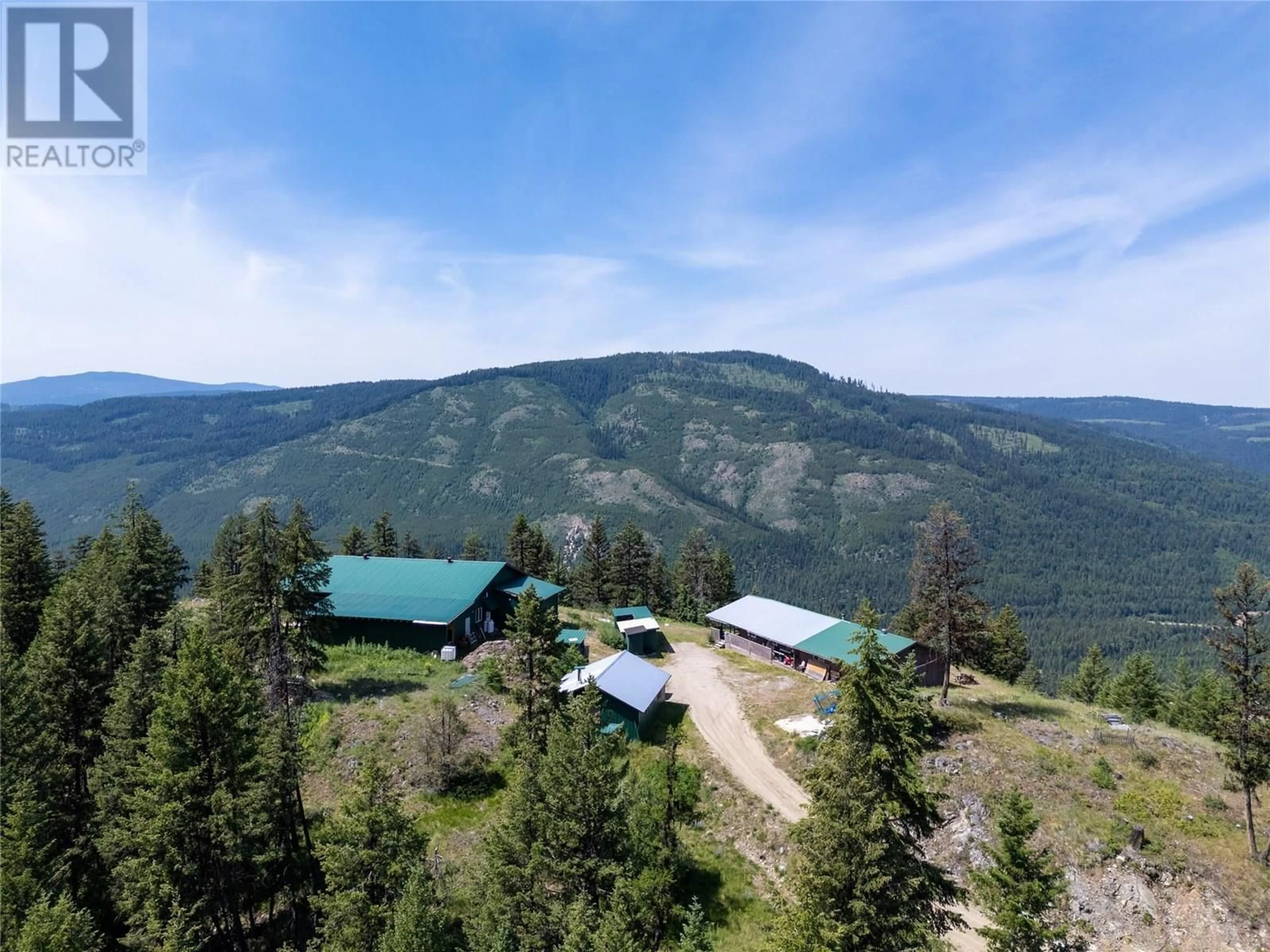 A pic from outside/outdoor area/front of a property/back of a property/a pic from drone, mountain view for 335 SOLOMON ROAD, Beaverdell British Columbia V0H1A0