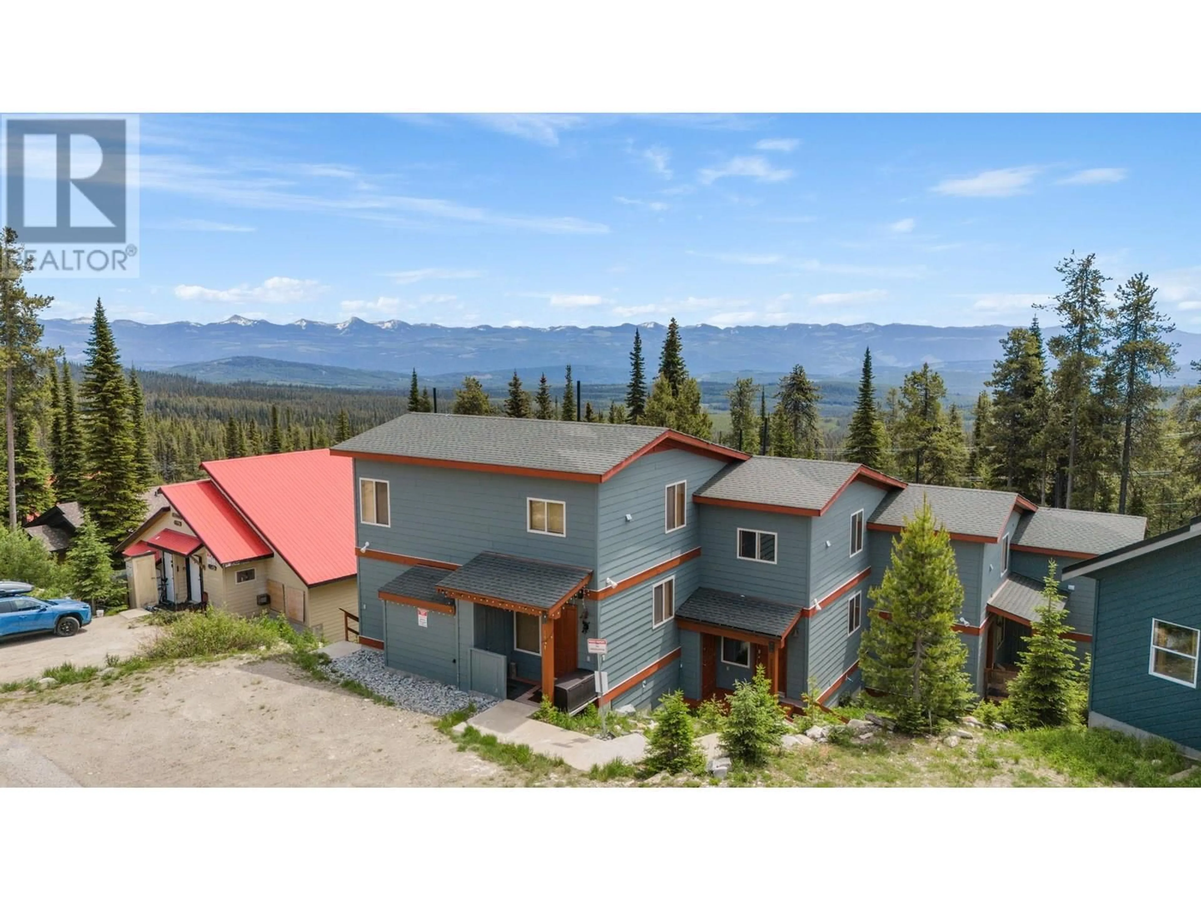 A pic from outside/outdoor area/front of a property/back of a property/a pic from drone, mountain view for B - 4821 SNOW PINES ROAD, Big White British Columbia V1P1P3