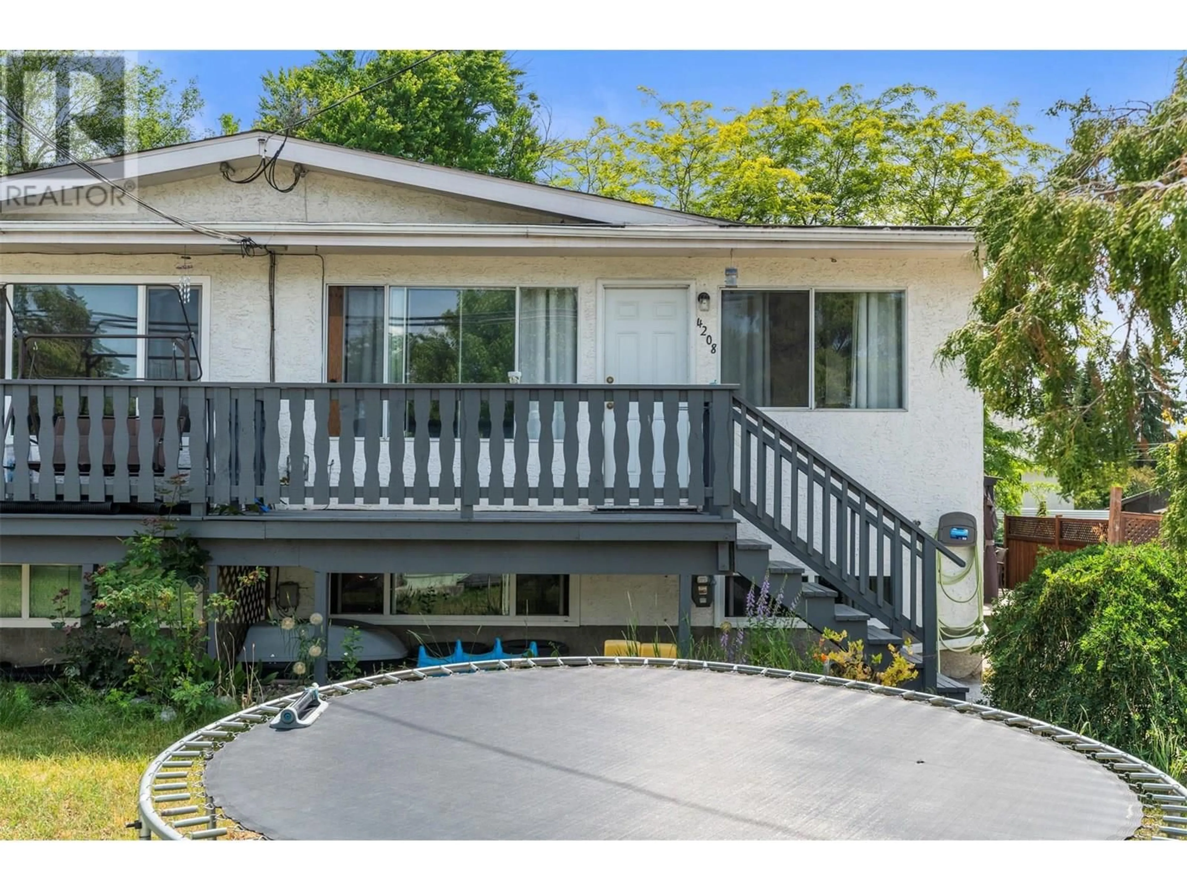 A pic from outside/outdoor area/front of a property/back of a property/a pic from drone, street for 4208 16 AVENUE, Vernon British Columbia V1T6P1