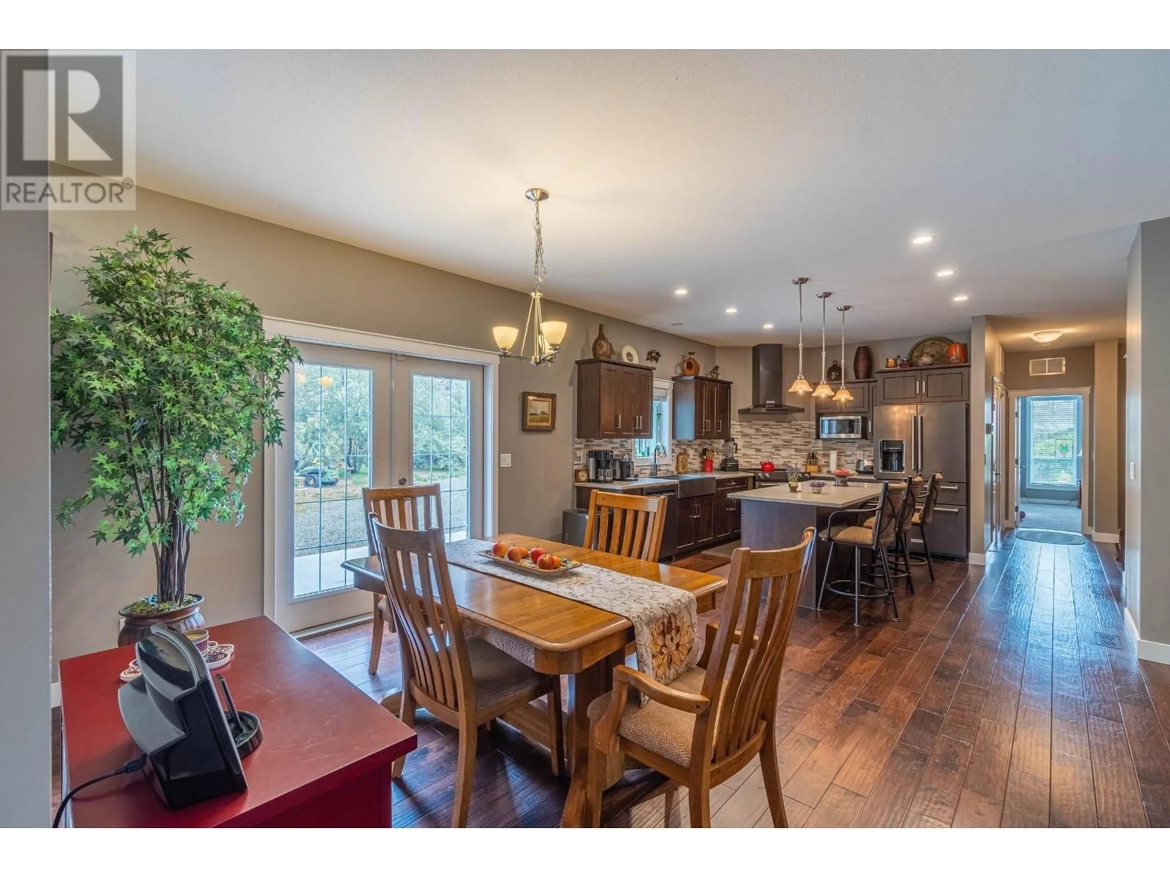 Open concept kitchen, wood/laminate floor for 3395 SHUSWAP ROAD, Kamloops British Columbia V2H1T2