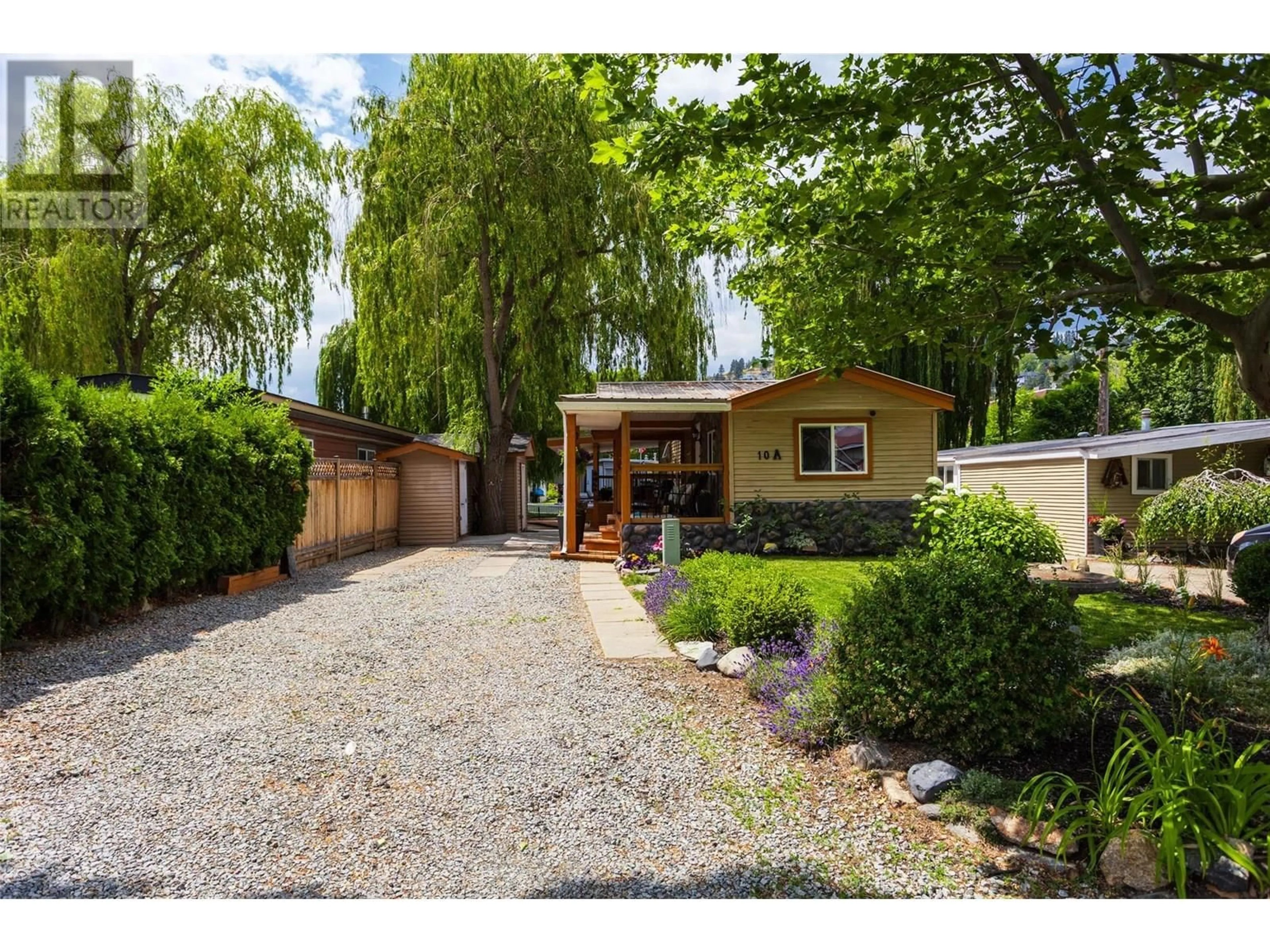 A pic from outside/outdoor area/front of a property/back of a property/a pic from drone, street for 10A - 1375 GREEN BAY ROAD, West Kelowna British Columbia V4T2B8
