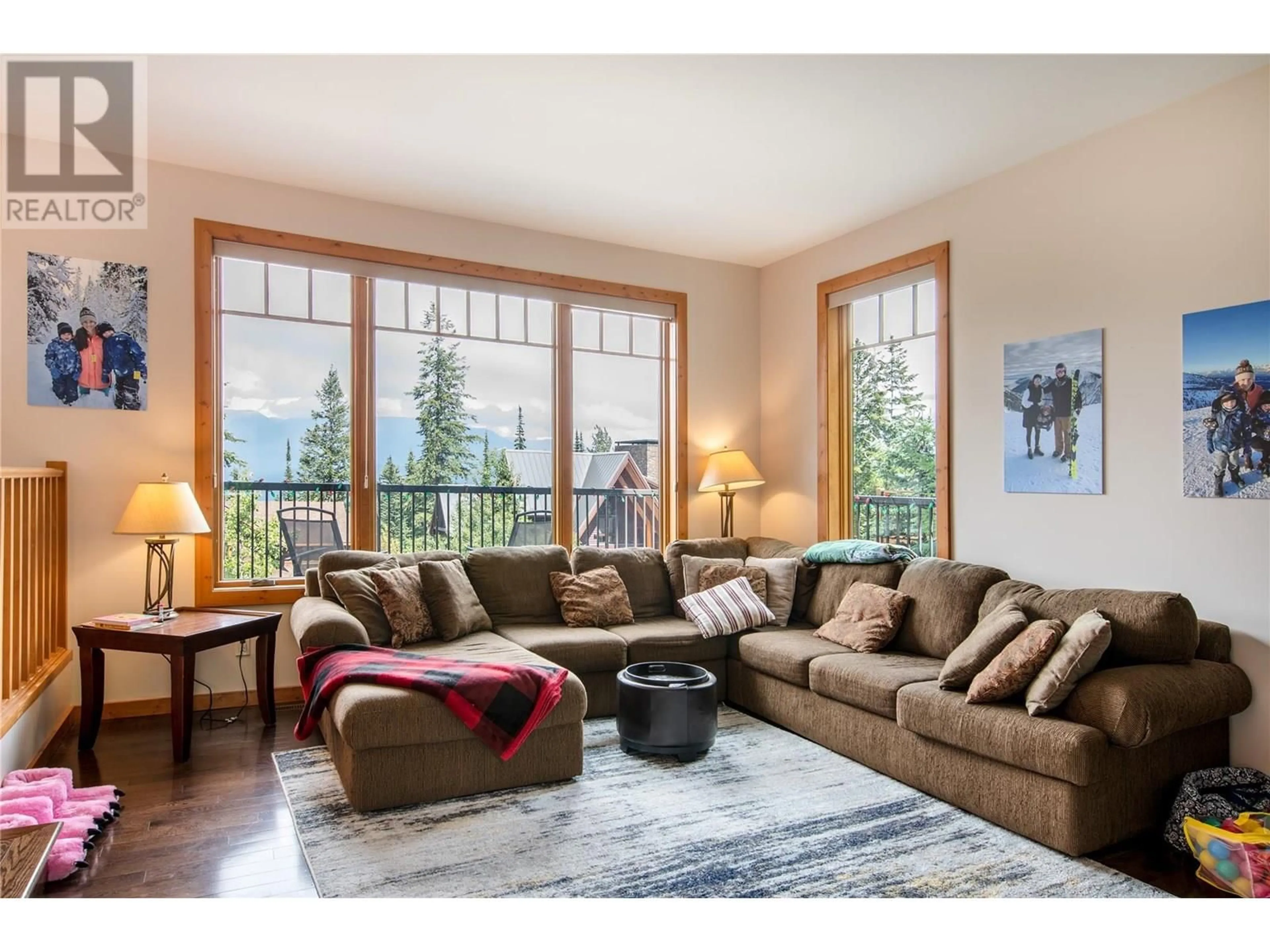 Living room with furniture, wood/laminate floor for 1589 COLUMBIA VALLEY VIEW, Golden British Columbia V0A1H2