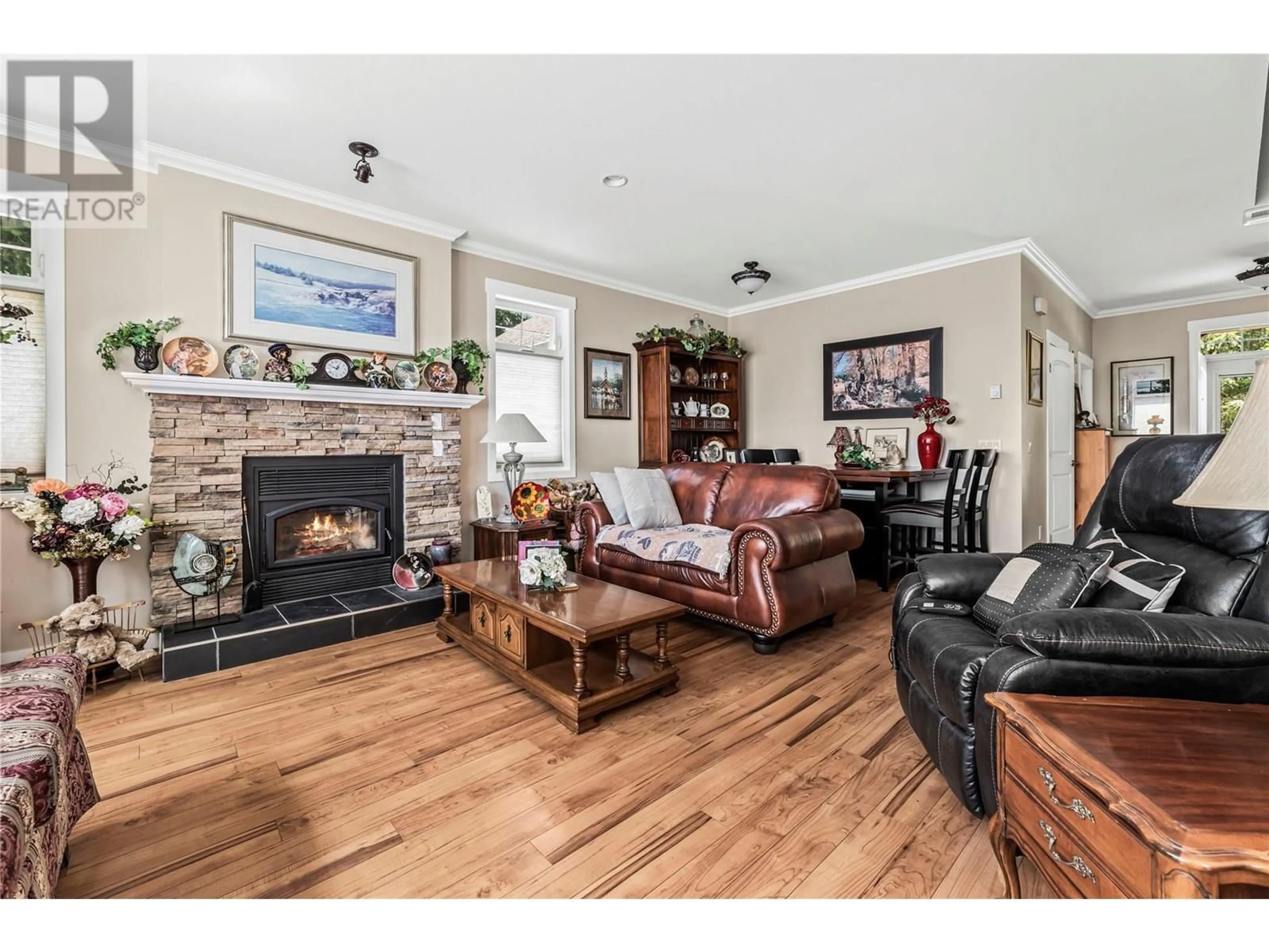 Living room with furniture, wood/laminate floor for 3447 ROBERGE ROAD, Tappen British Columbia V0E2X2