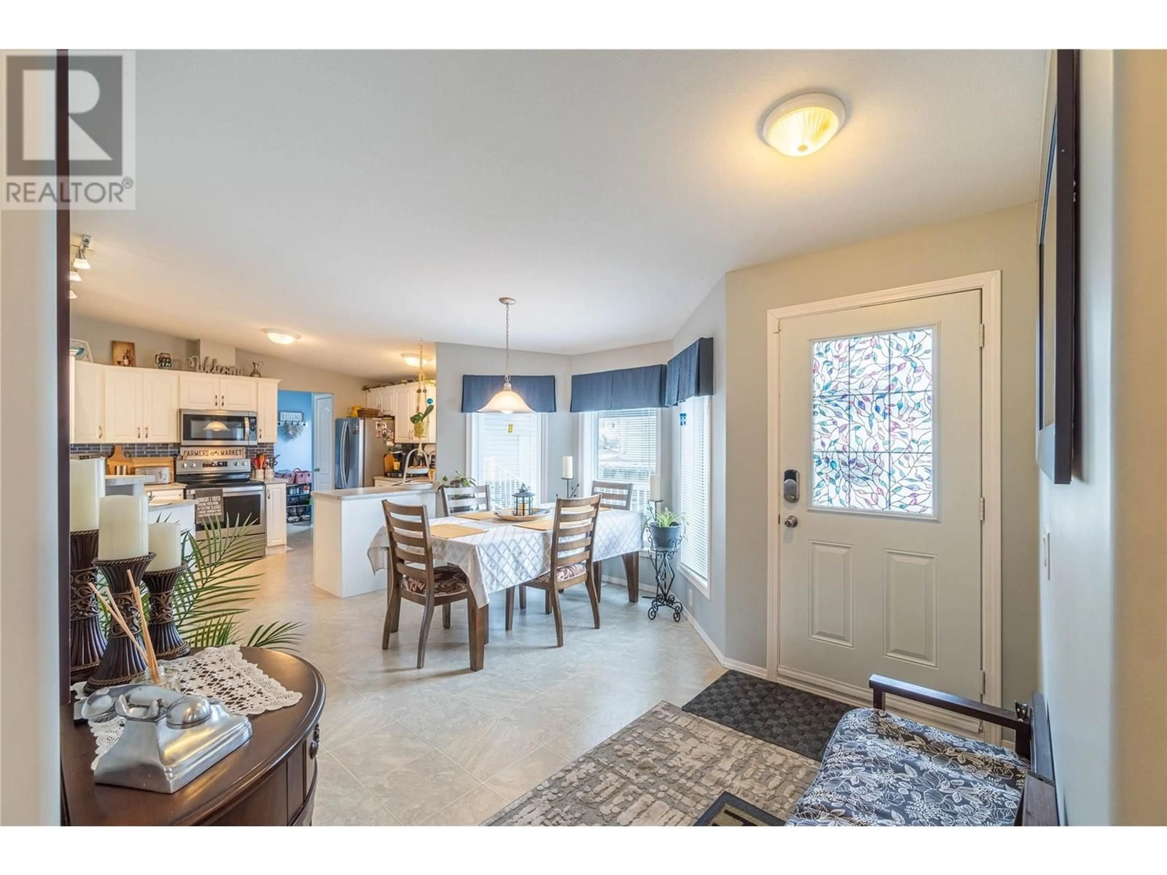 Open concept kitchen, ceramic/tile floor for 1 - 768 SHUSWAP ROAD EAST, Kamloops British Columbia V2H0A4
