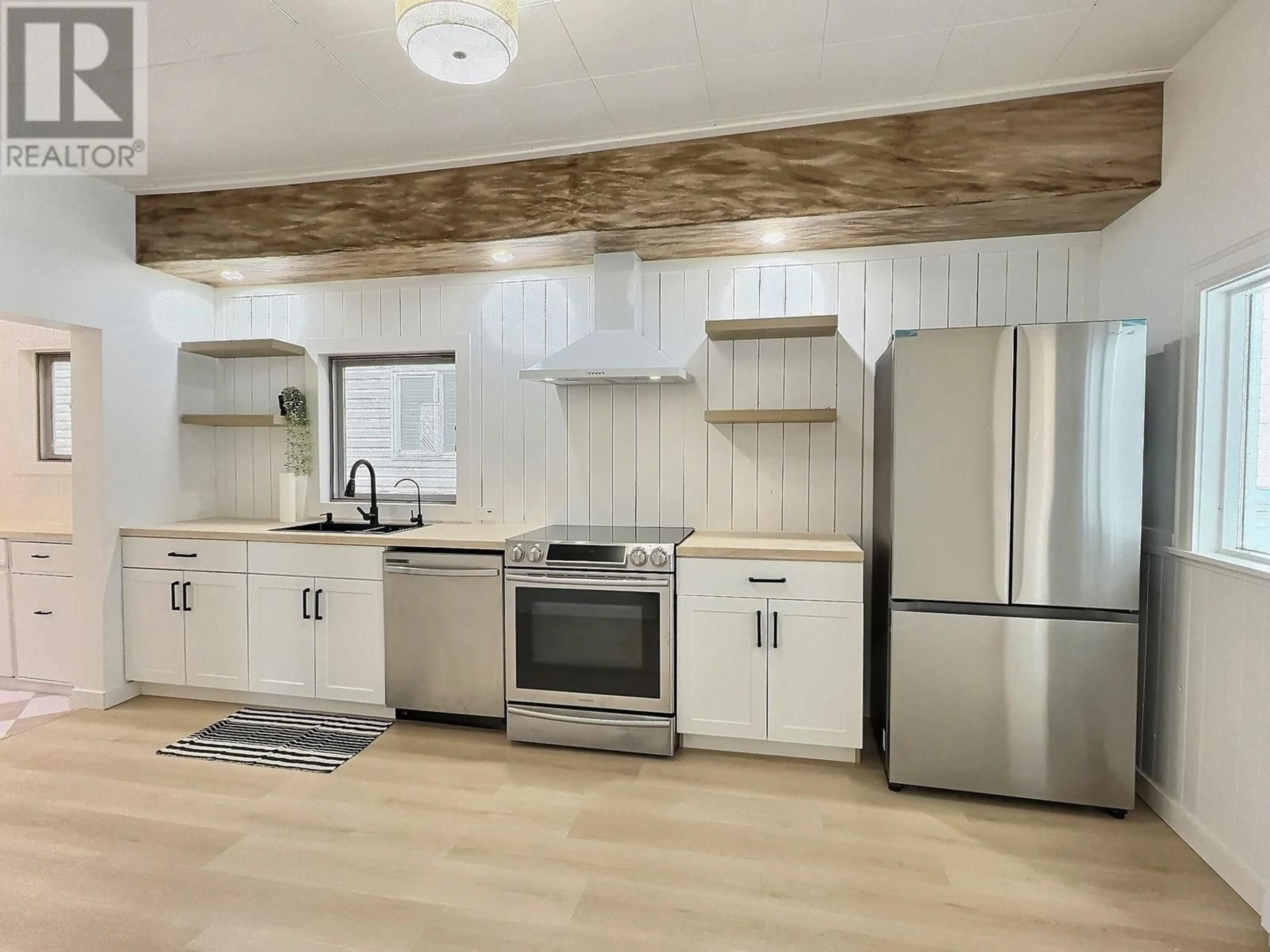Open concept kitchen, wood/laminate floor for 730 OKANAGAN AVENUE, Chase British Columbia V0E1M0