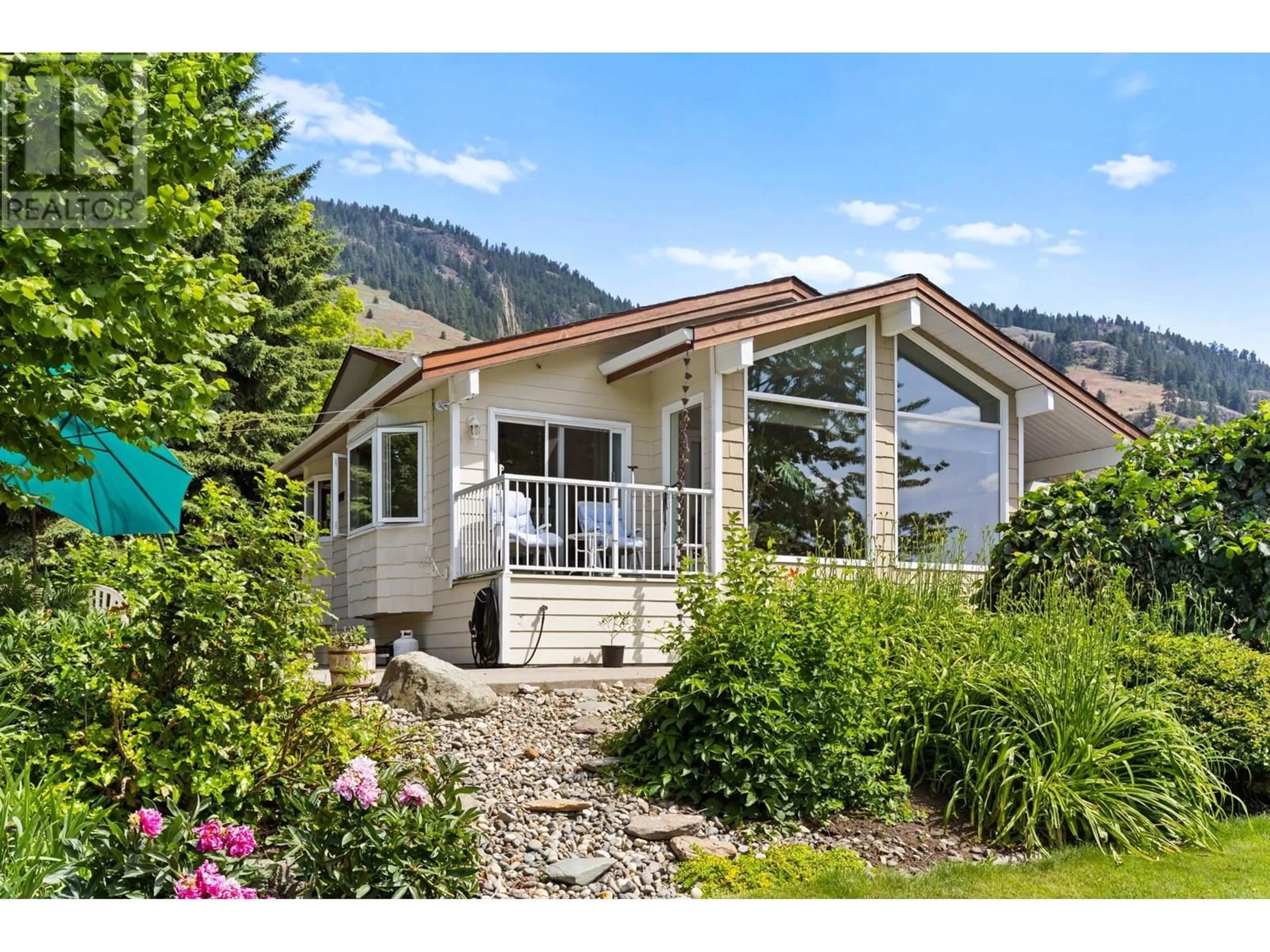 Home with vinyl exterior material, mountain view for 6651 BUCHANAN ROAD, Coldstream British Columbia V1B3C6
