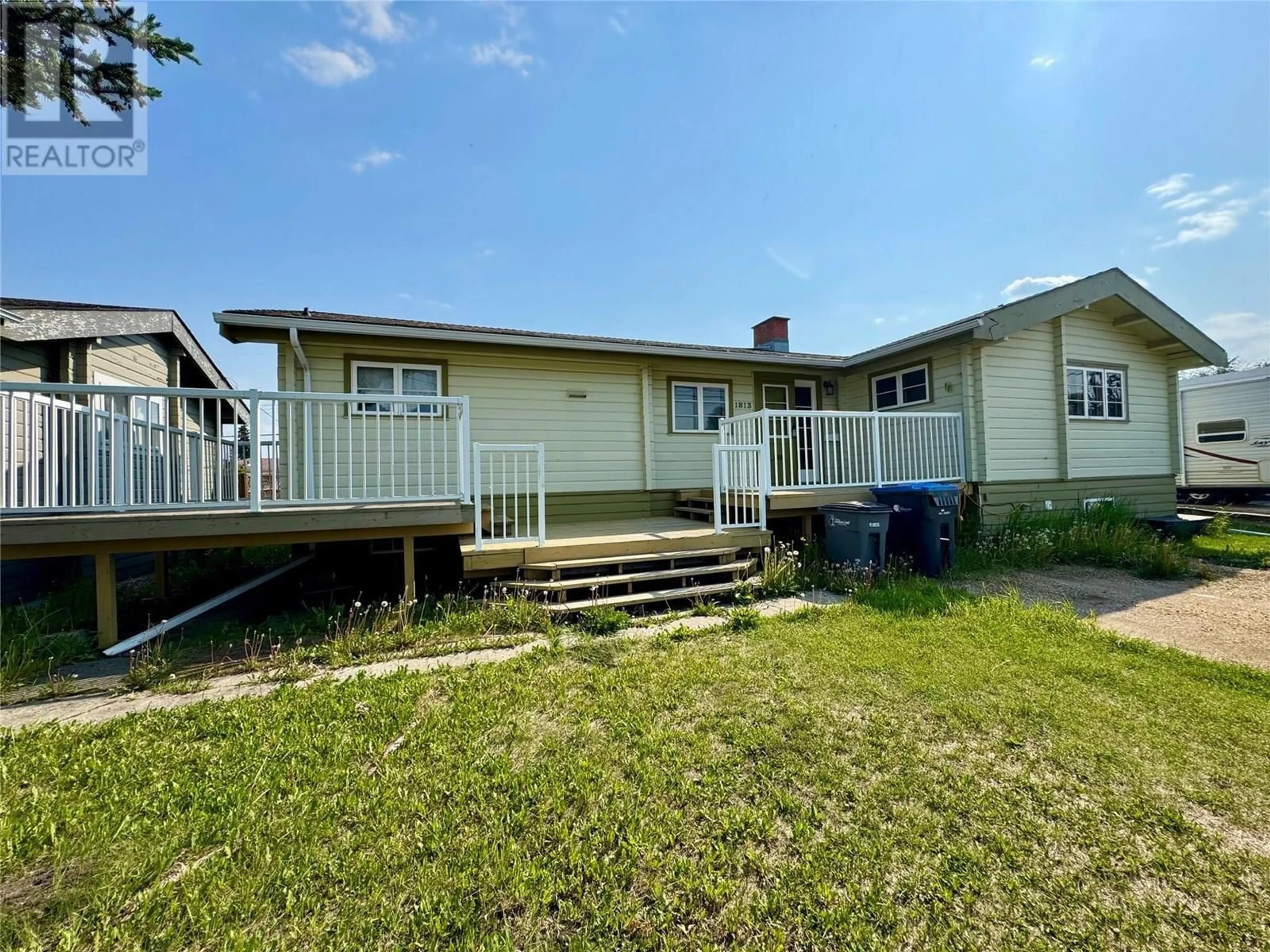 A pic from outside/outdoor area/front of a property/back of a property/a pic from drone, unknown for 1813 108 AVENUE, Dawson Creek British Columbia V1G2T9