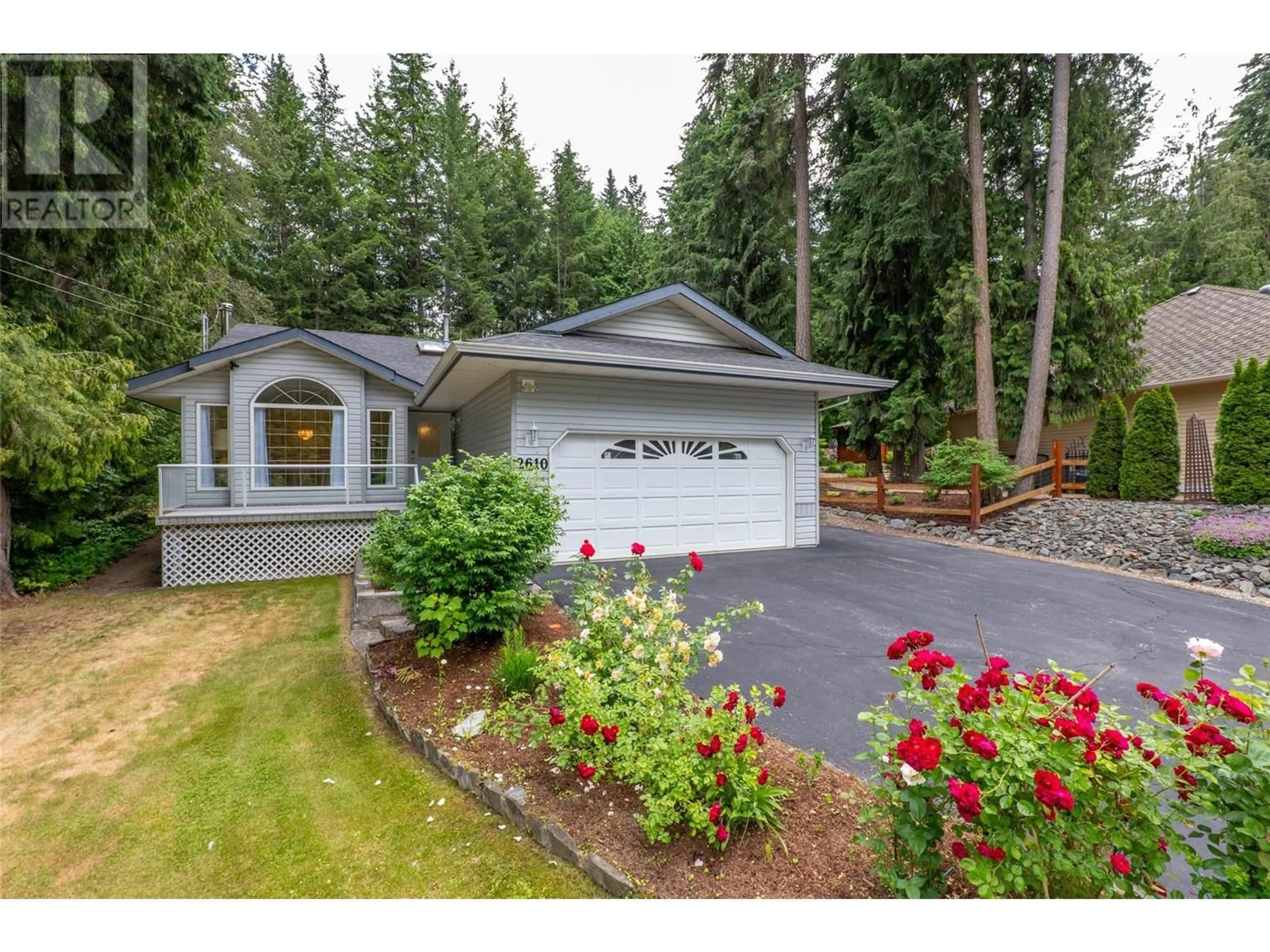 Home with vinyl exterior material, forest/trees view for 2610 CENTENNIAL DRIVE, Blind Bay British Columbia V0E1H0