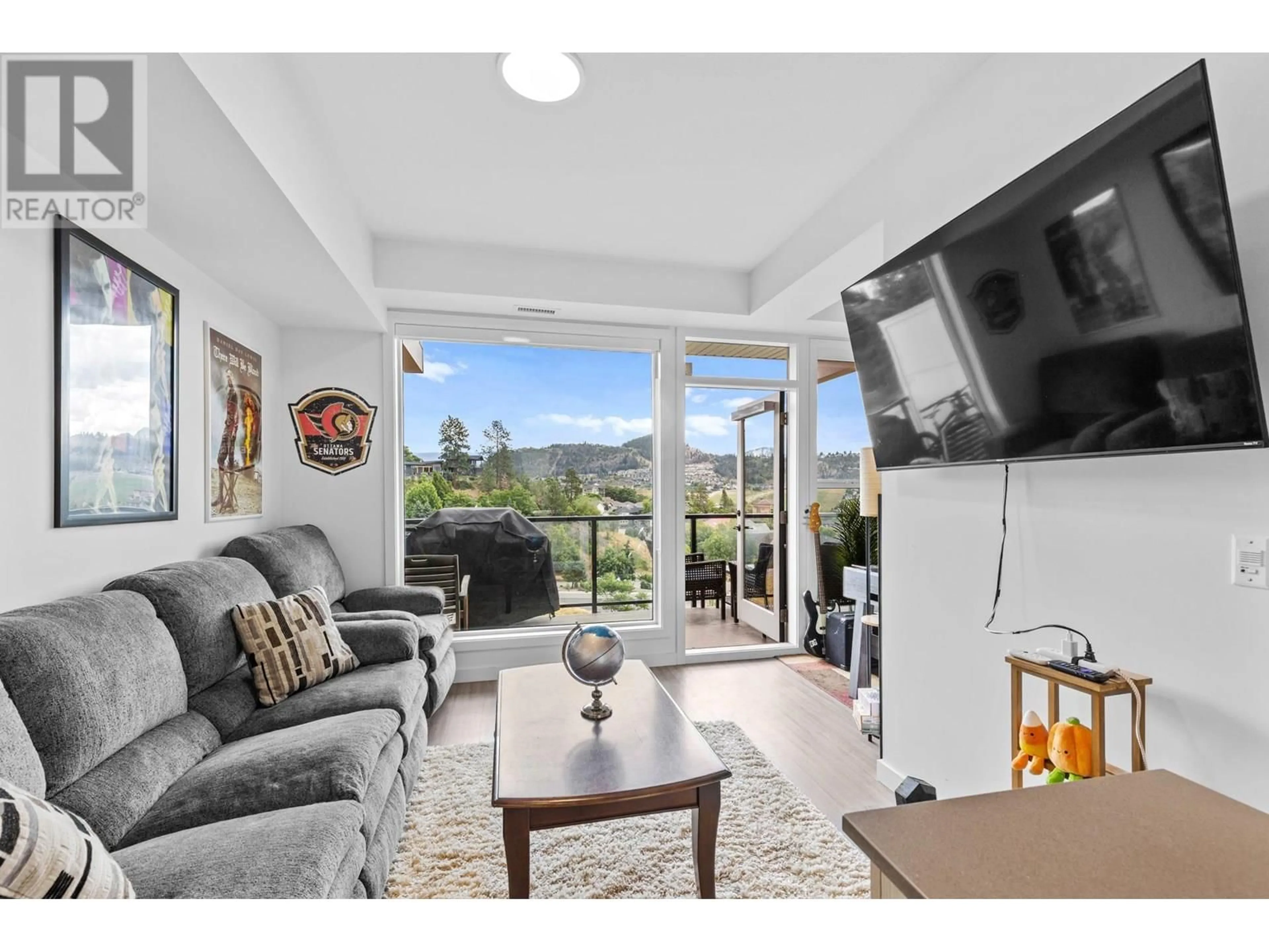 Living room with furniture, unknown for 61 - 685 BOYNTON PLACE, Kelowna British Columbia V1V0G7