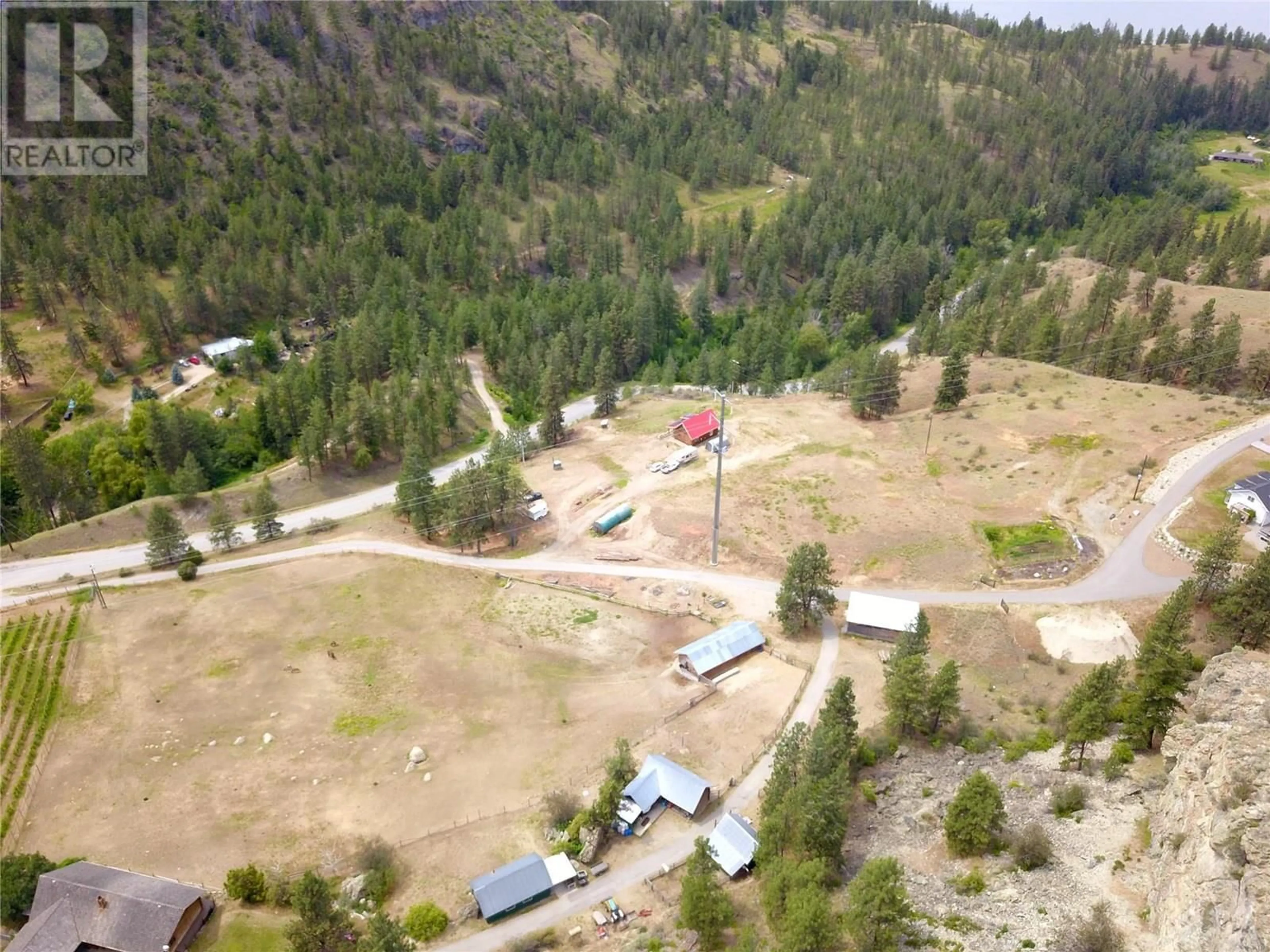 A pic from outside/outdoor area/front of a property/back of a property/a pic from drone, mountain view for 3655 MCLEAN CREEK ROAD, Okanagan Falls British Columbia V0H1R5