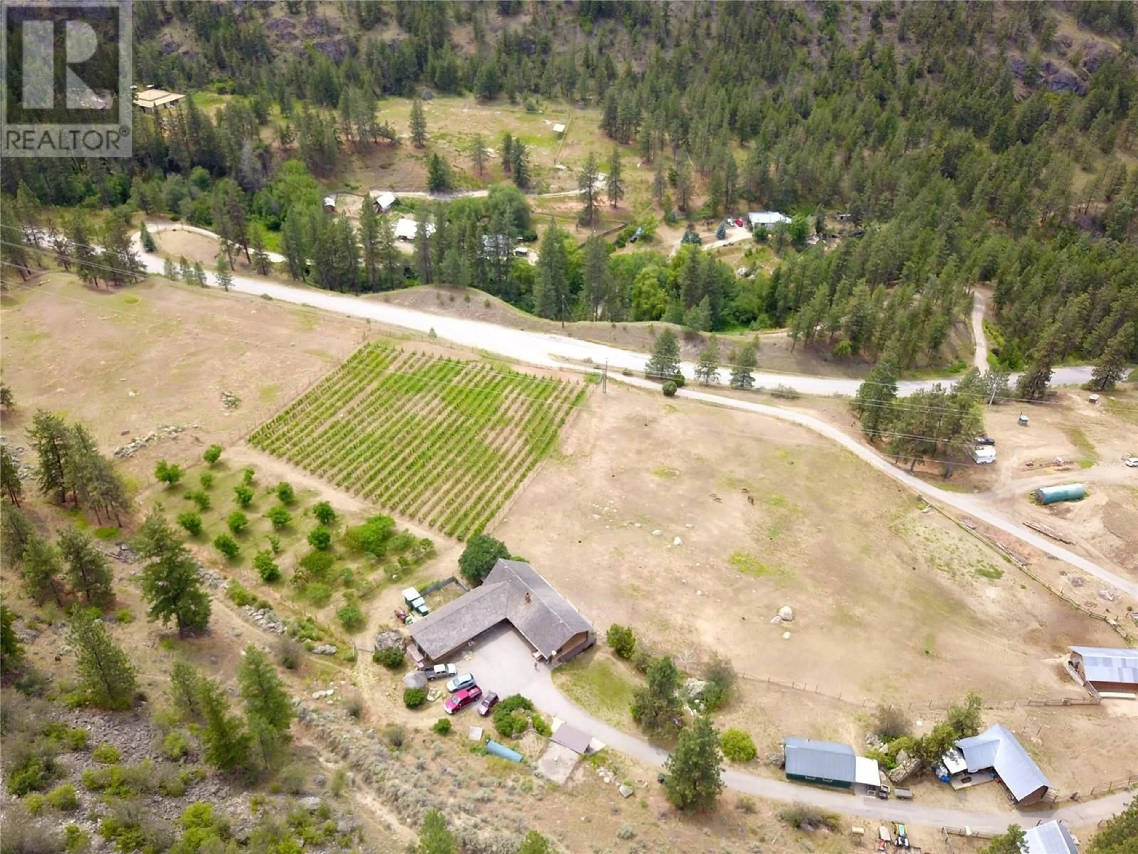 A pic from outside/outdoor area/front of a property/back of a property/a pic from drone, mountain view for 3655 MCLEAN CREEK ROAD, Okanagan Falls British Columbia V0H1R5