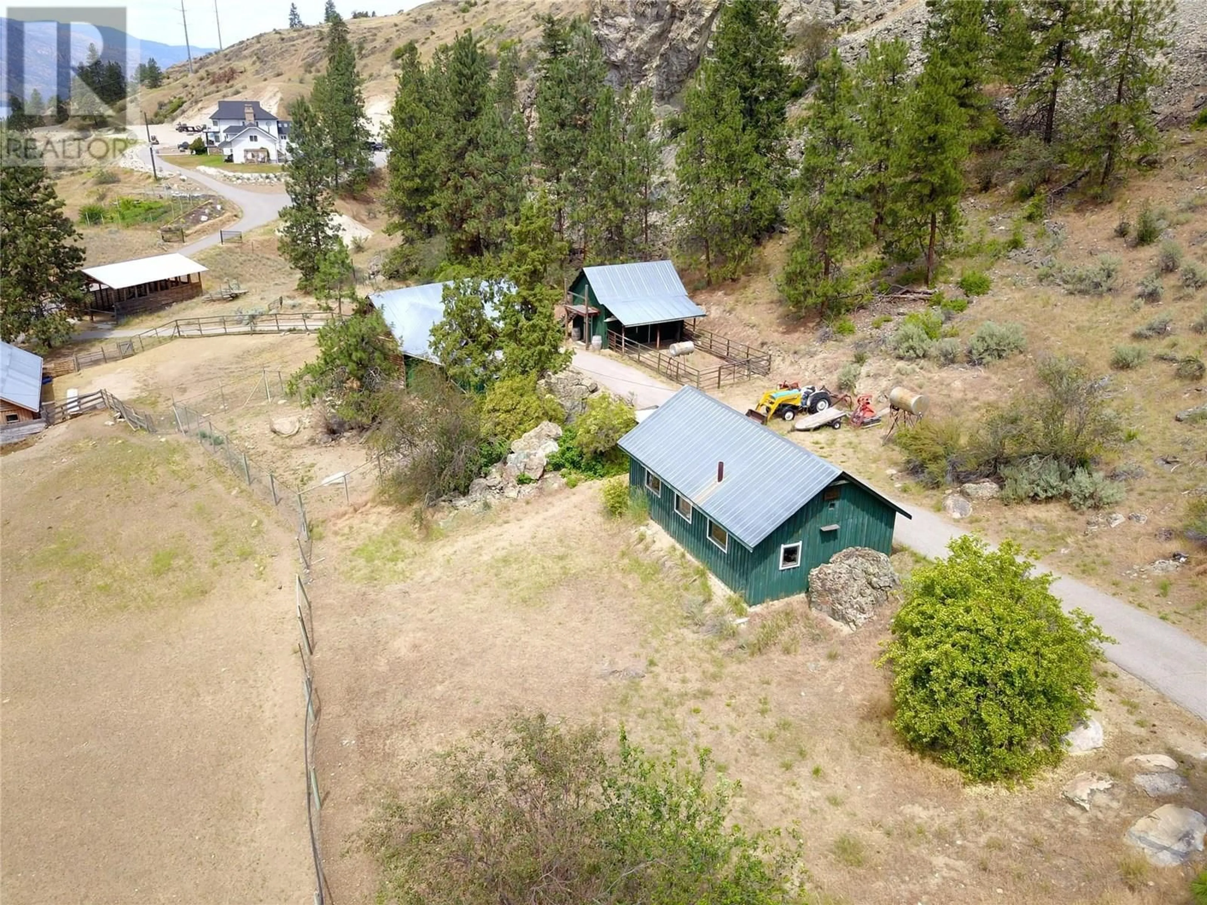 A pic from outside/outdoor area/front of a property/back of a property/a pic from drone, mountain view for 3655 MCLEAN CREEK ROAD, Okanagan Falls British Columbia V0H1R5