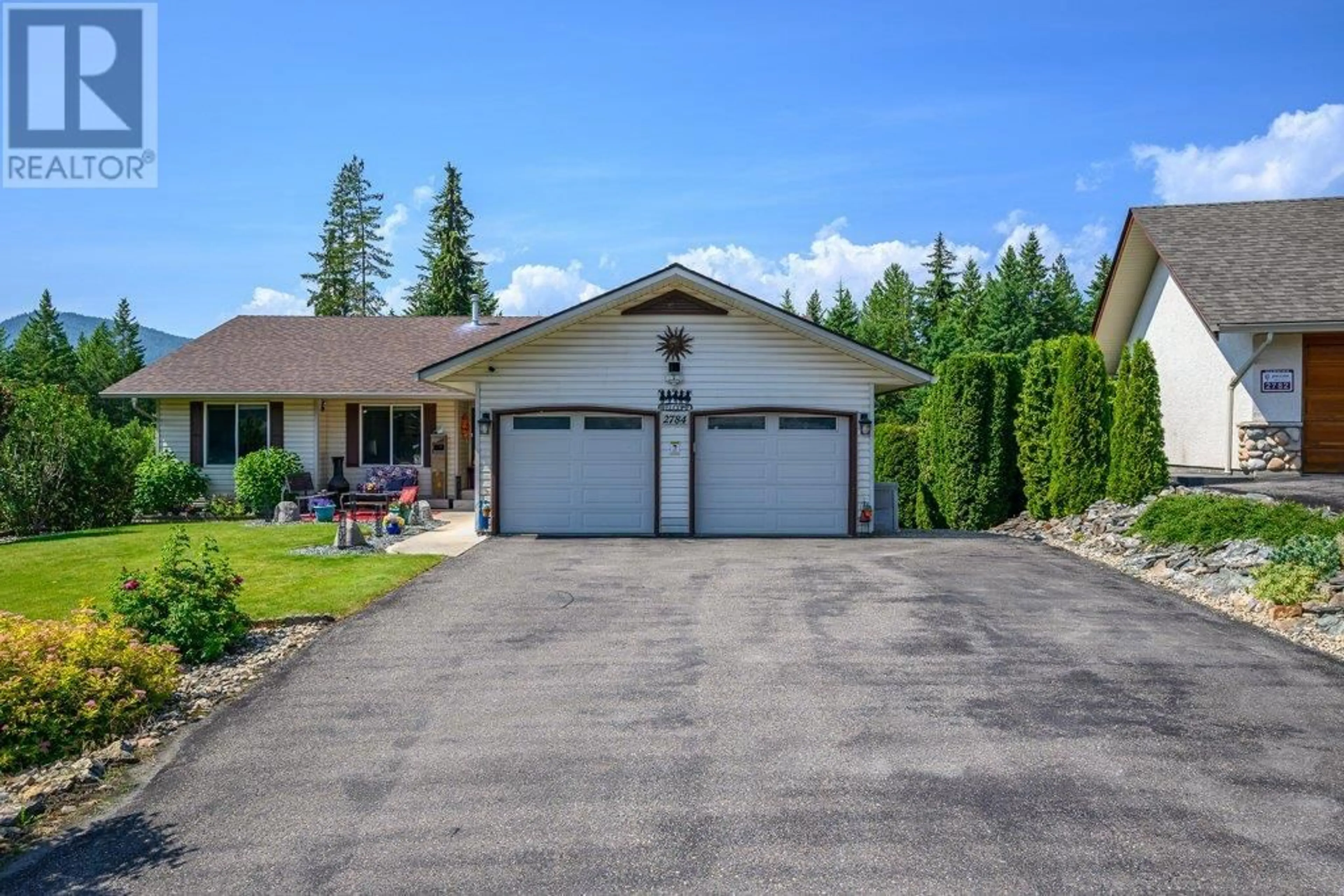 A pic from outside/outdoor area/front of a property/back of a property/a pic from drone, street for 2784 GOLF COURSE DRIVE, Blind Bay British Columbia V0E1H1