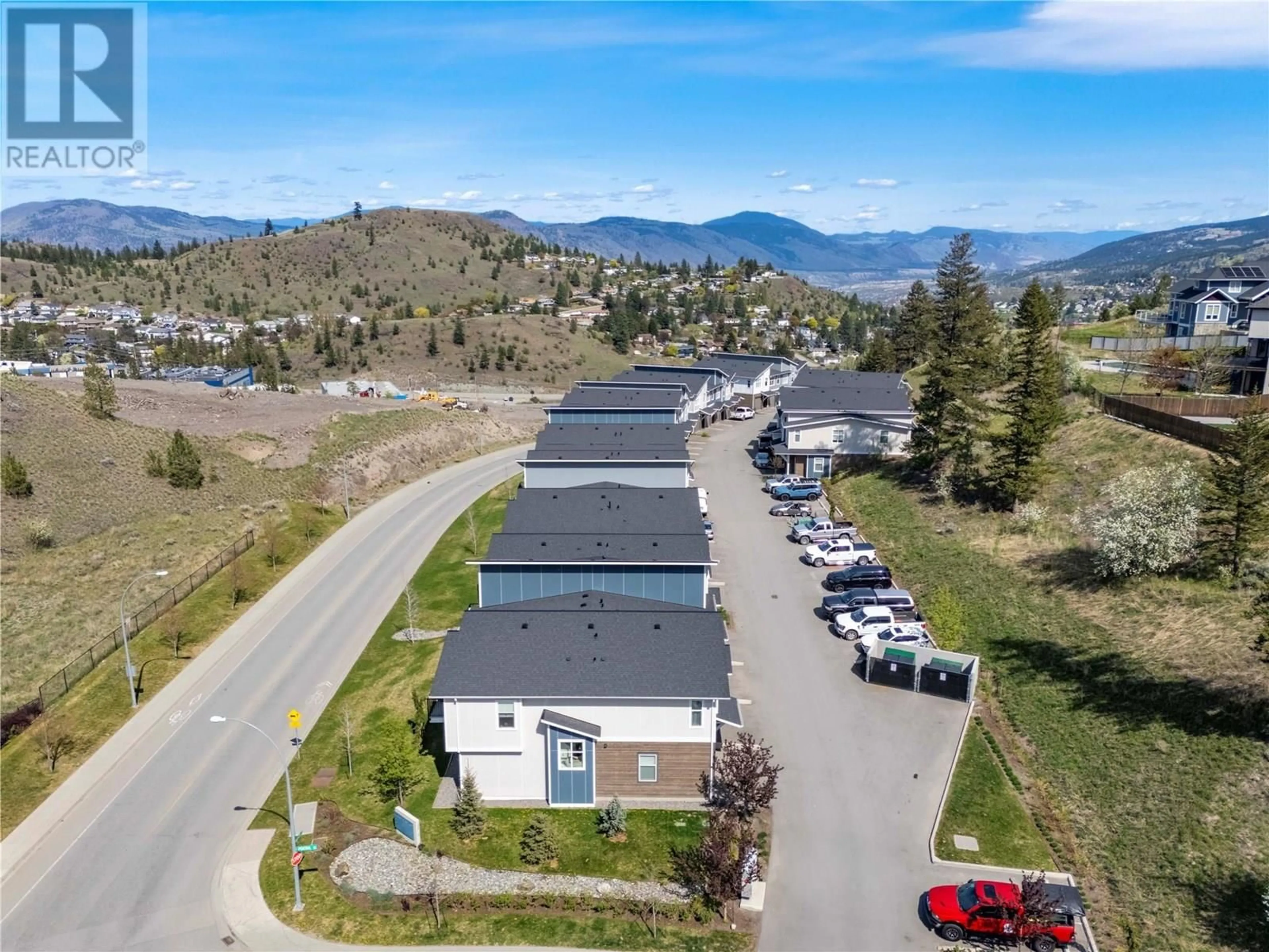 A pic from outside/outdoor area/front of a property/back of a property/a pic from drone, mountain view for 103 - 1701 FOXTAIL DRIVE, Kamloops British Columbia V1S0E9