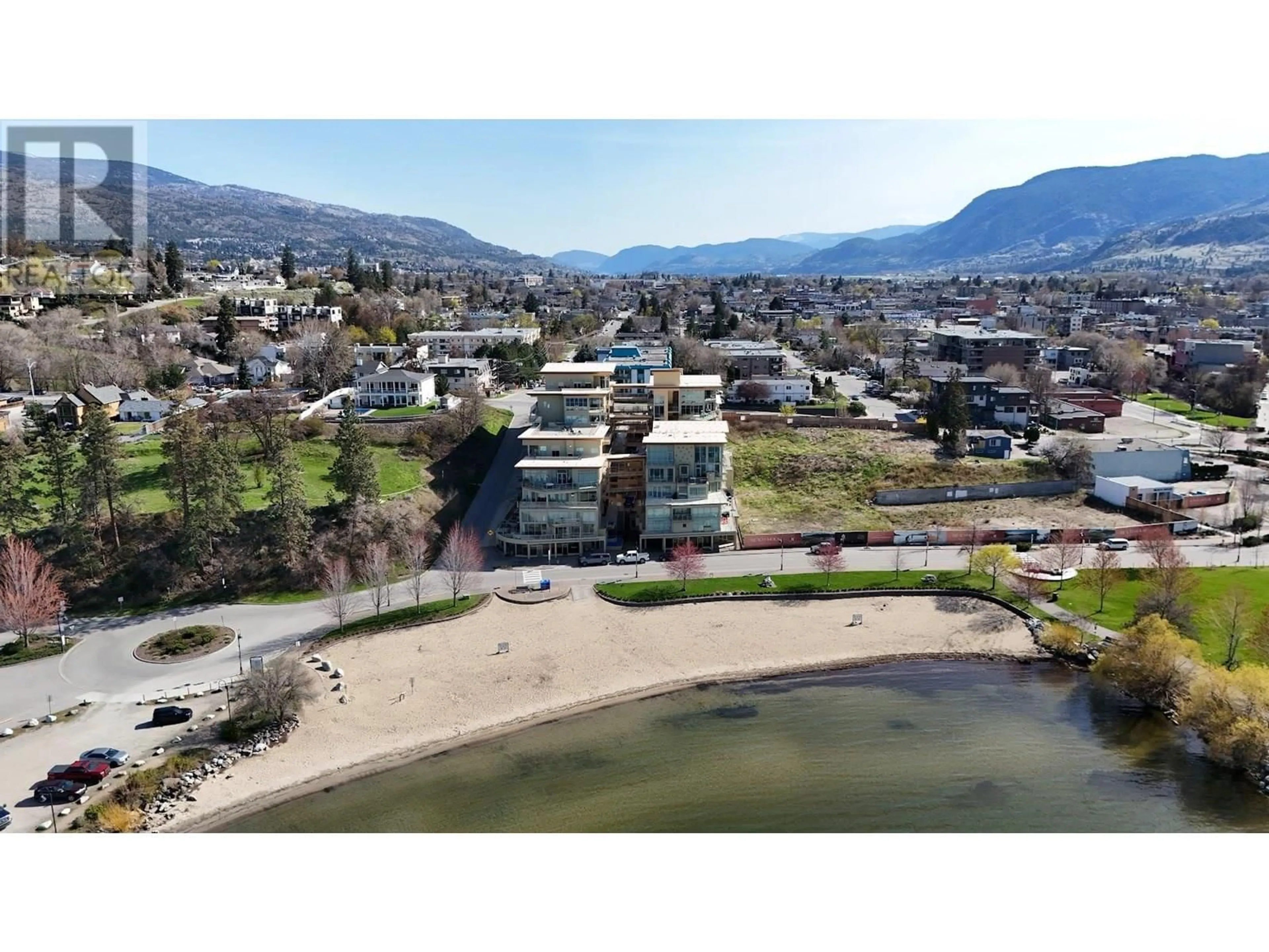 A pic from outside/outdoor area/front of a property/back of a property/a pic from drone, water/lake/river/ocean view for 506 - 250 MARINA WAY, Penticton British Columbia V2A1H4