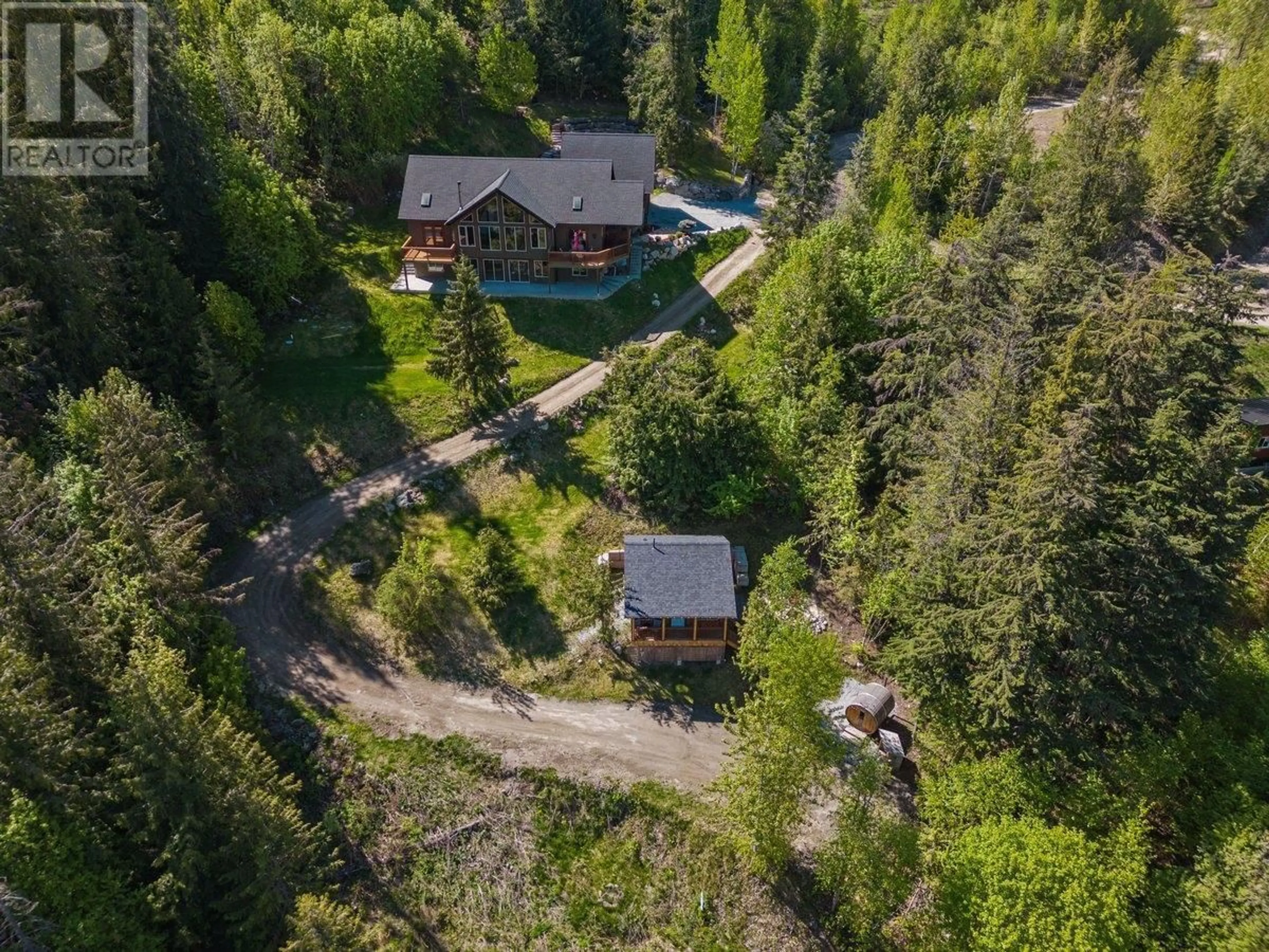 A pic from outside/outdoor area/front of a property/back of a property/a pic from drone, forest/trees view for 3213 VINDUSKY ROAD, Nelson British Columbia V1L6X7