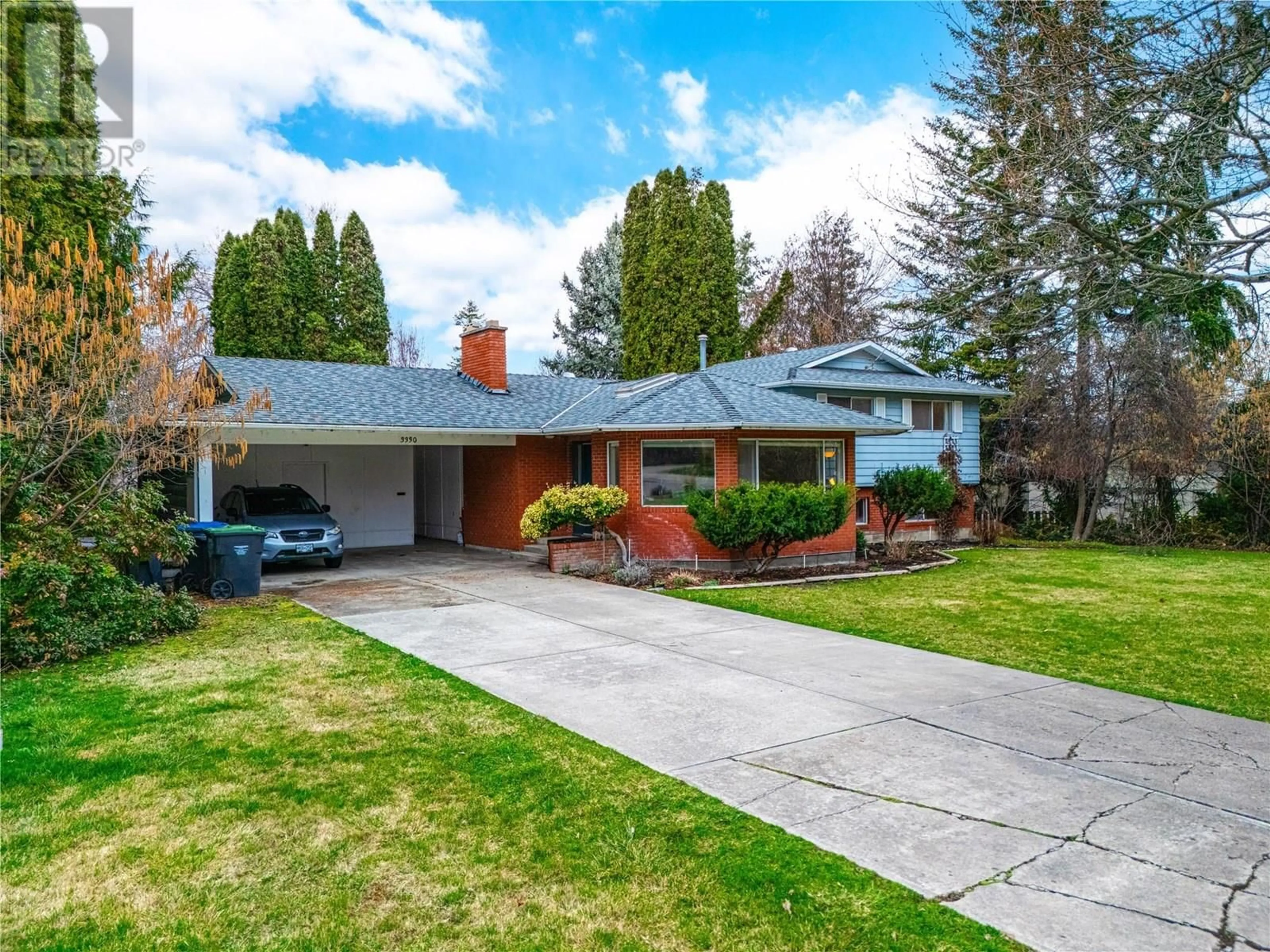 Home with brick exterior material, street for 3330 JACKSON COURT, Kelowna British Columbia V1W2T6