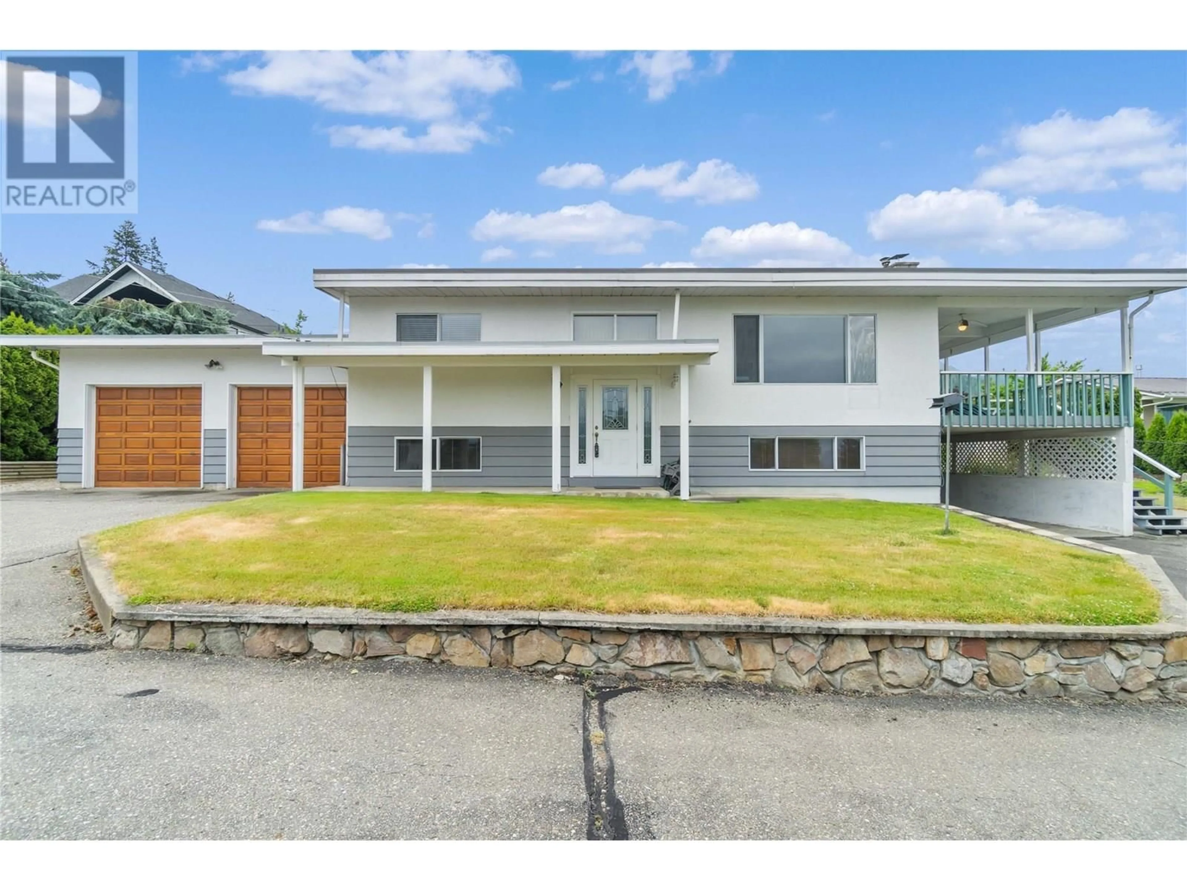 A pic from outside/outdoor area/front of a property/back of a property/a pic from drone, street for 1431 15 STREET SOUTHEAST, Salmon Arm British Columbia V1E2G8