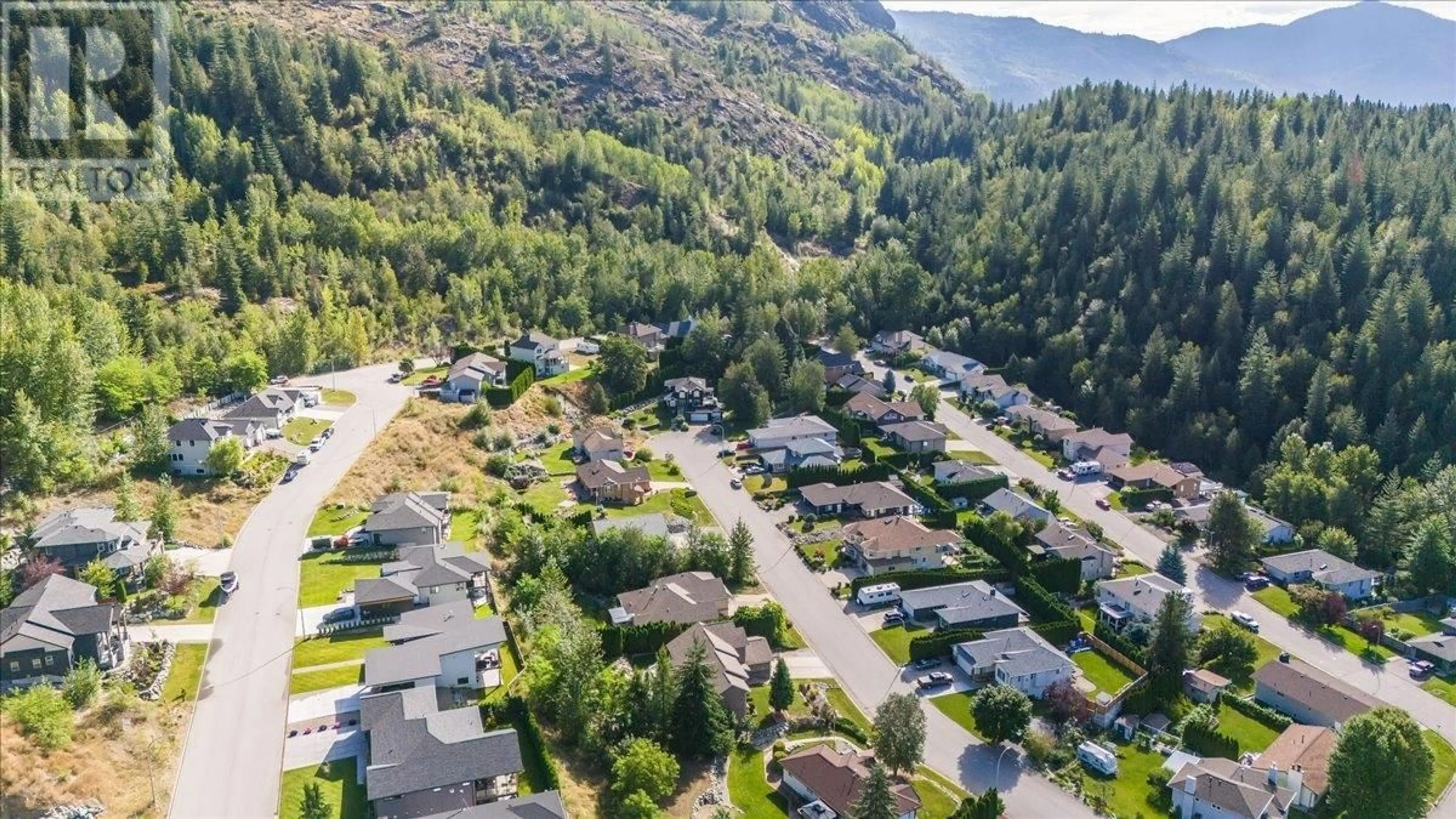 A pic from outside/outdoor area/front of a property/back of a property/a pic from drone, mountain view for 2310 MCBRIDE STREET, Trail British Columbia V1R4N8