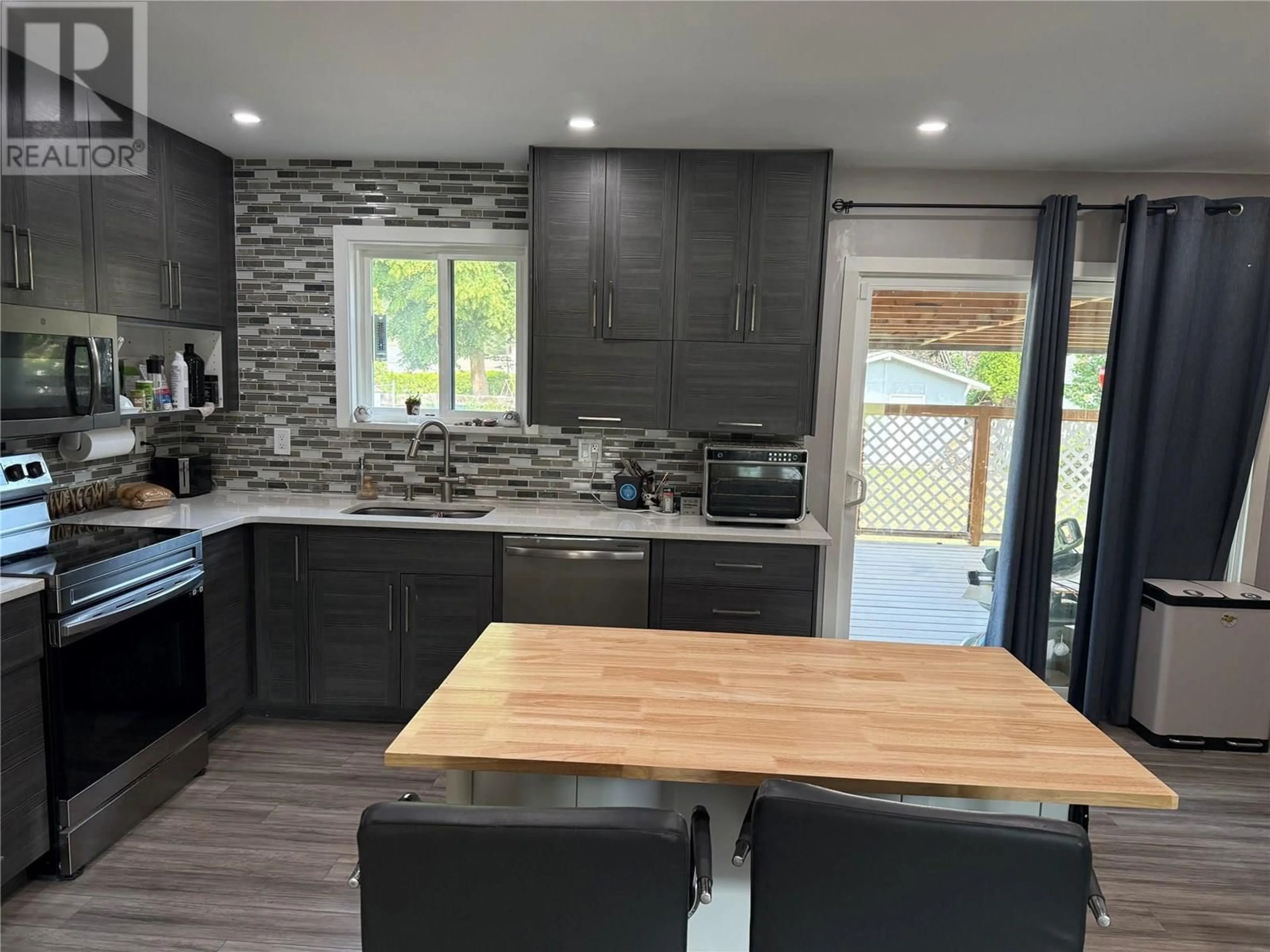 Open concept kitchen, unknown for 4596 CAMMERAY DRIVE, Kamloops British Columbia V2H1L4