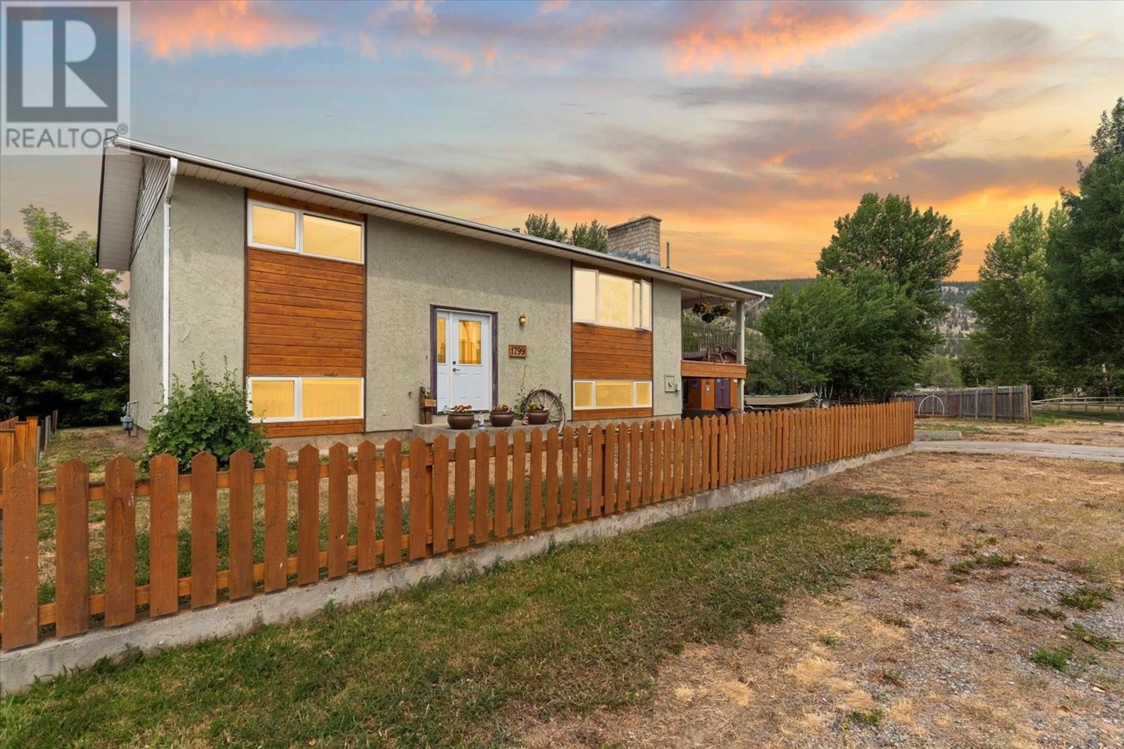 A pic from outside/outdoor area/front of a property/back of a property/a pic from drone, street for 1799 SPRING STREET, Merritt British Columbia V1K1B8