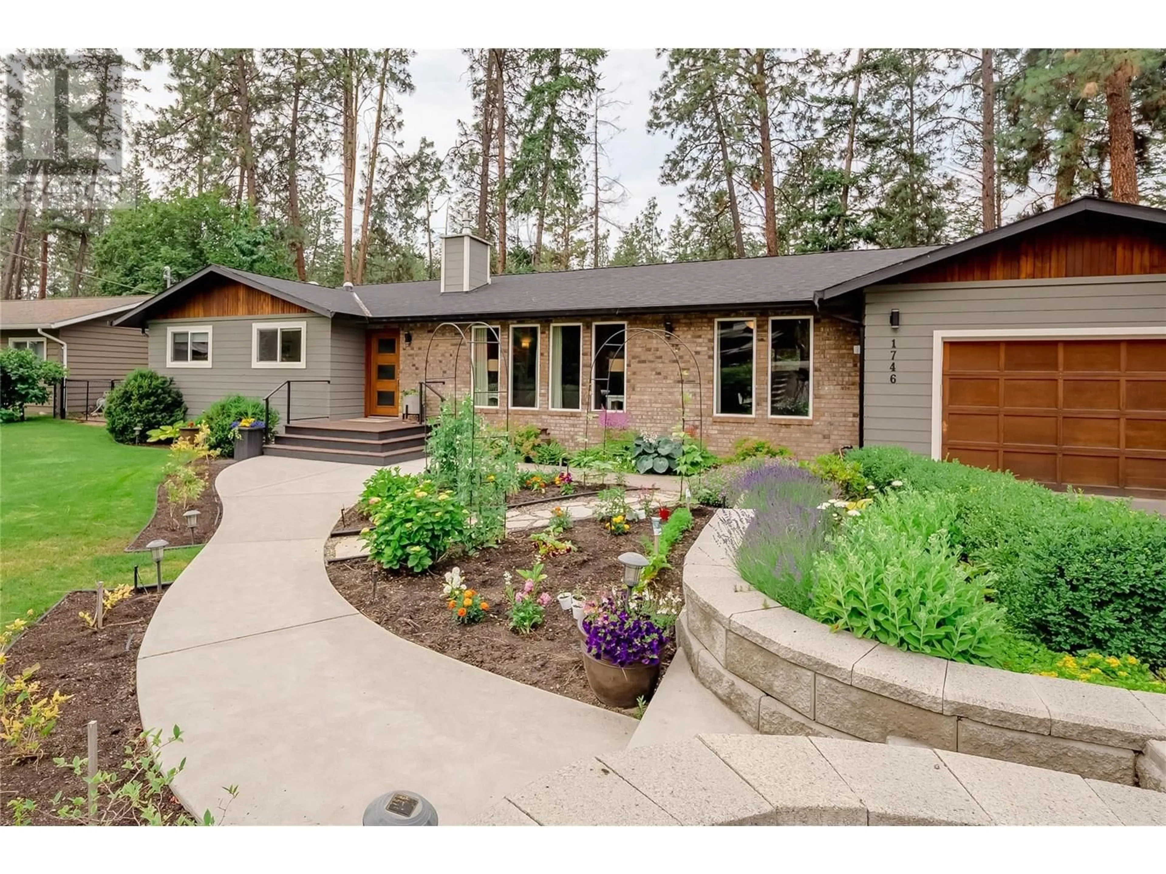 Home with brick exterior material, street for 1746 LEWIS ROAD, Kelowna British Columbia V1P1E5