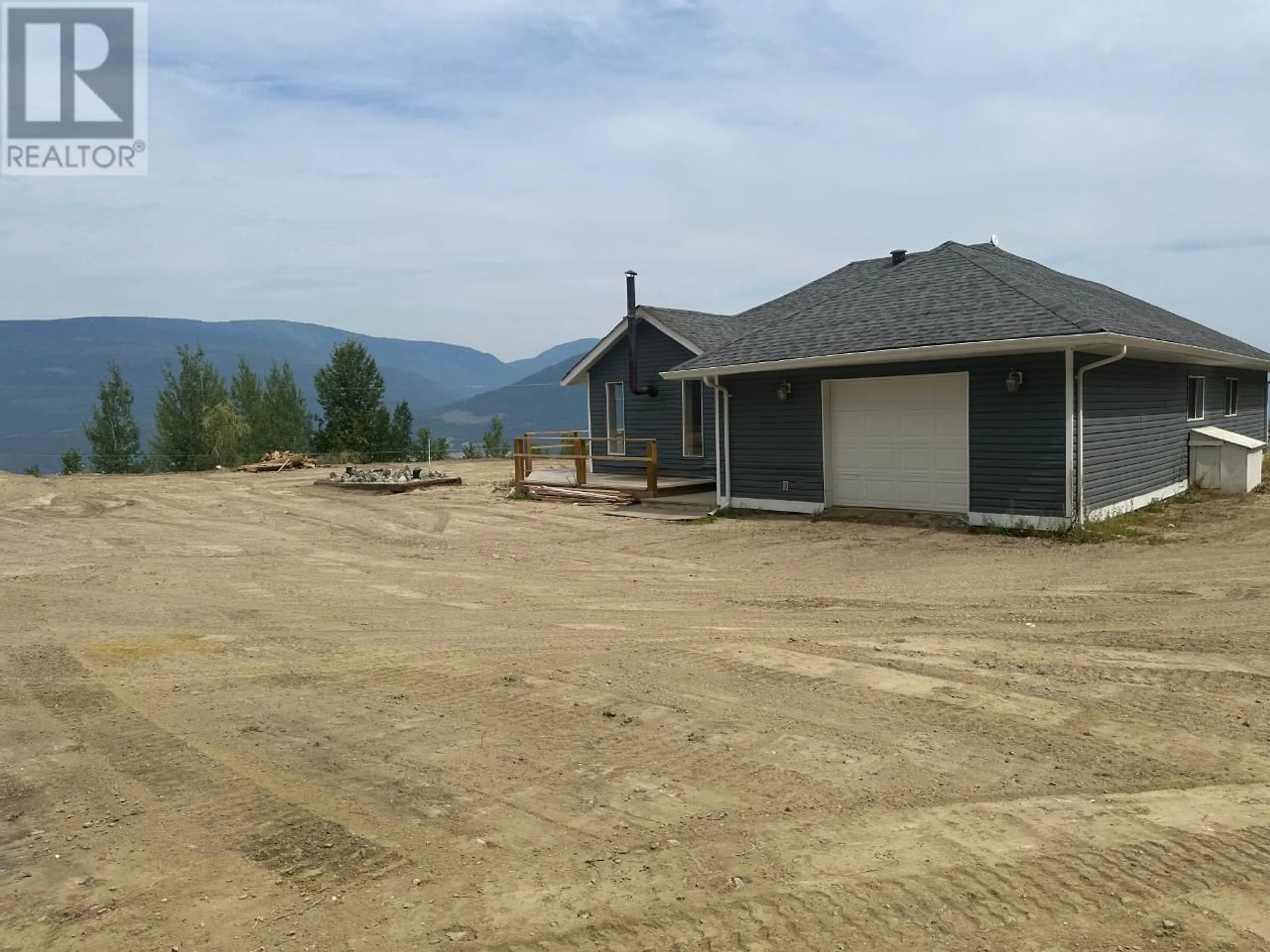 A pic from outside/outdoor area/front of a property/back of a property/a pic from drone, mountain view for 4652 ROSE CRESCENT, Eagle Bay British Columbia V0E1T0