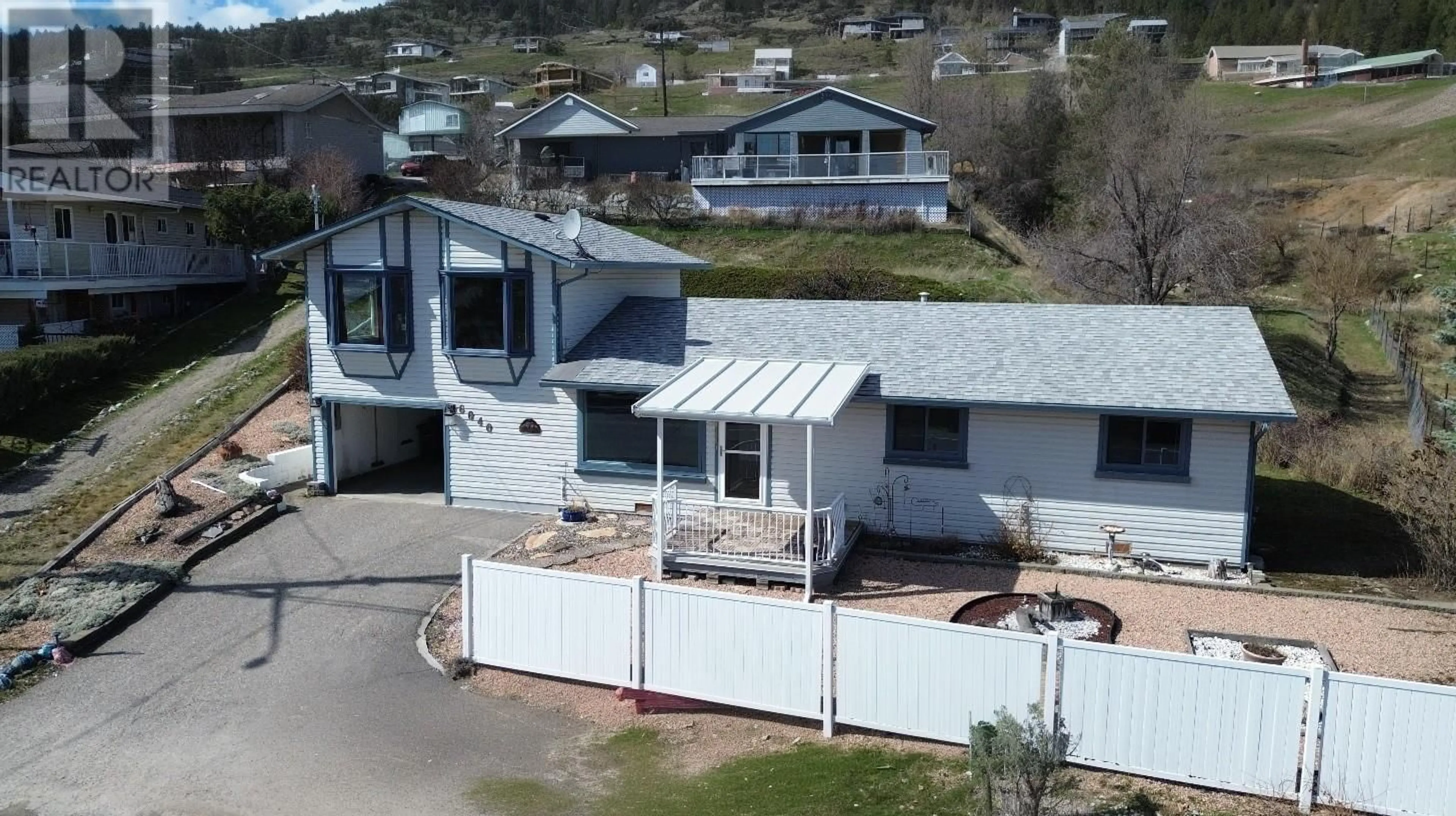A pic from outside/outdoor area/front of a property/back of a property/a pic from drone, unknown for 6040 ELLISON AVENUE, Peachland British Columbia V0H1X4