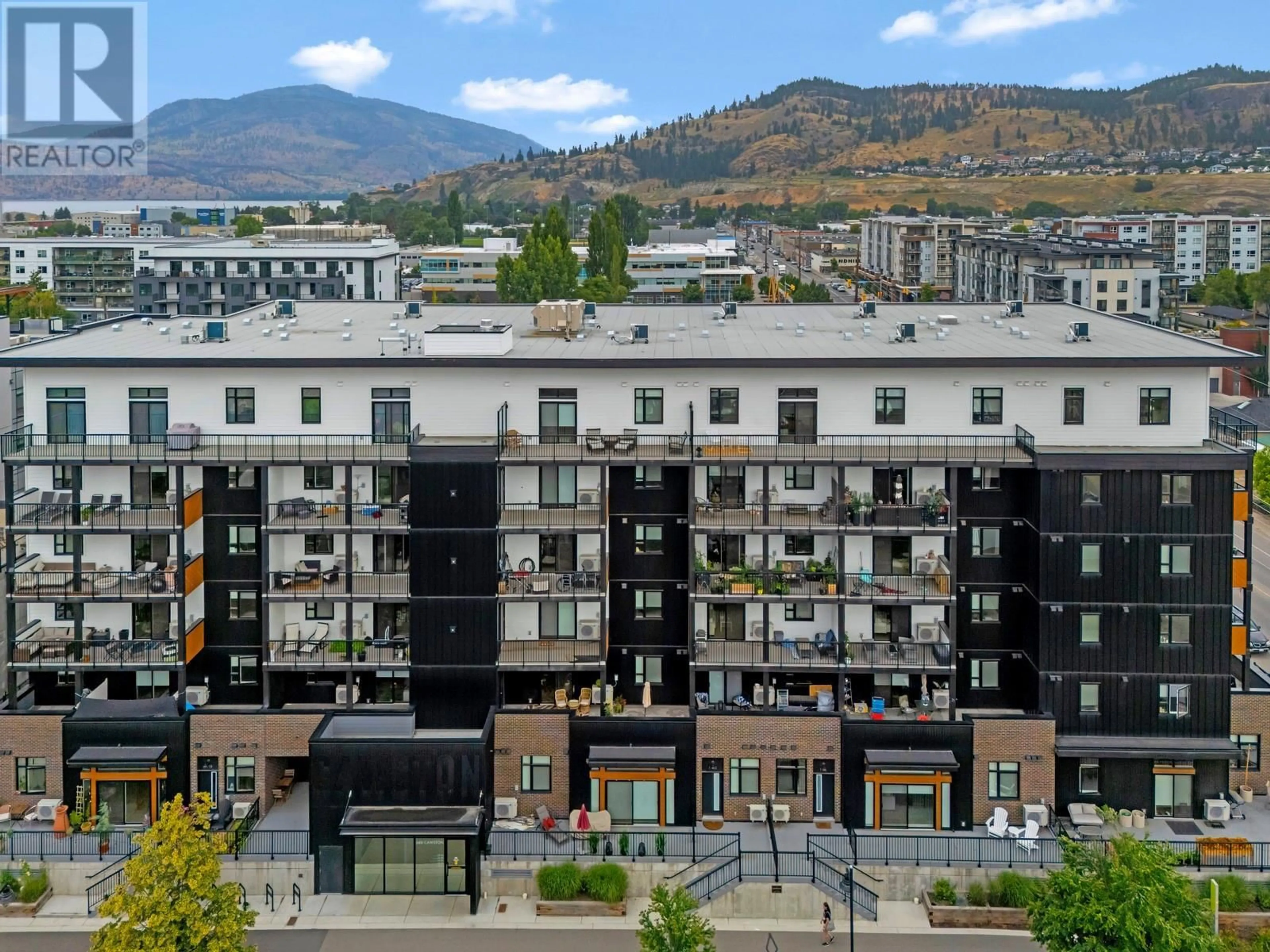 A pic from outside/outdoor area/front of a property/back of a property/a pic from drone, mountain view for 209 - 660 CAWSTON AVENUE NORTH, Kelowna British Columbia V1Y9M1