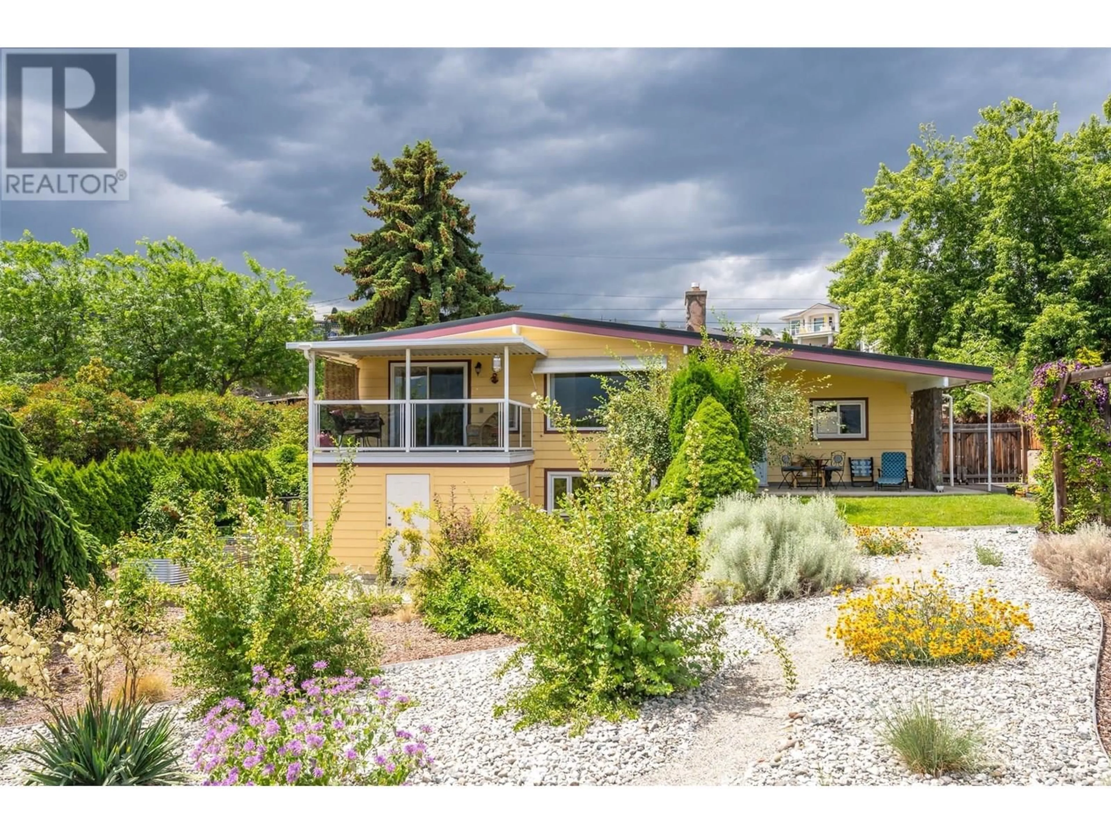 Home with brick exterior material, street for 13807 LATIMER AVENUE, Summerland British Columbia V0H1Z1