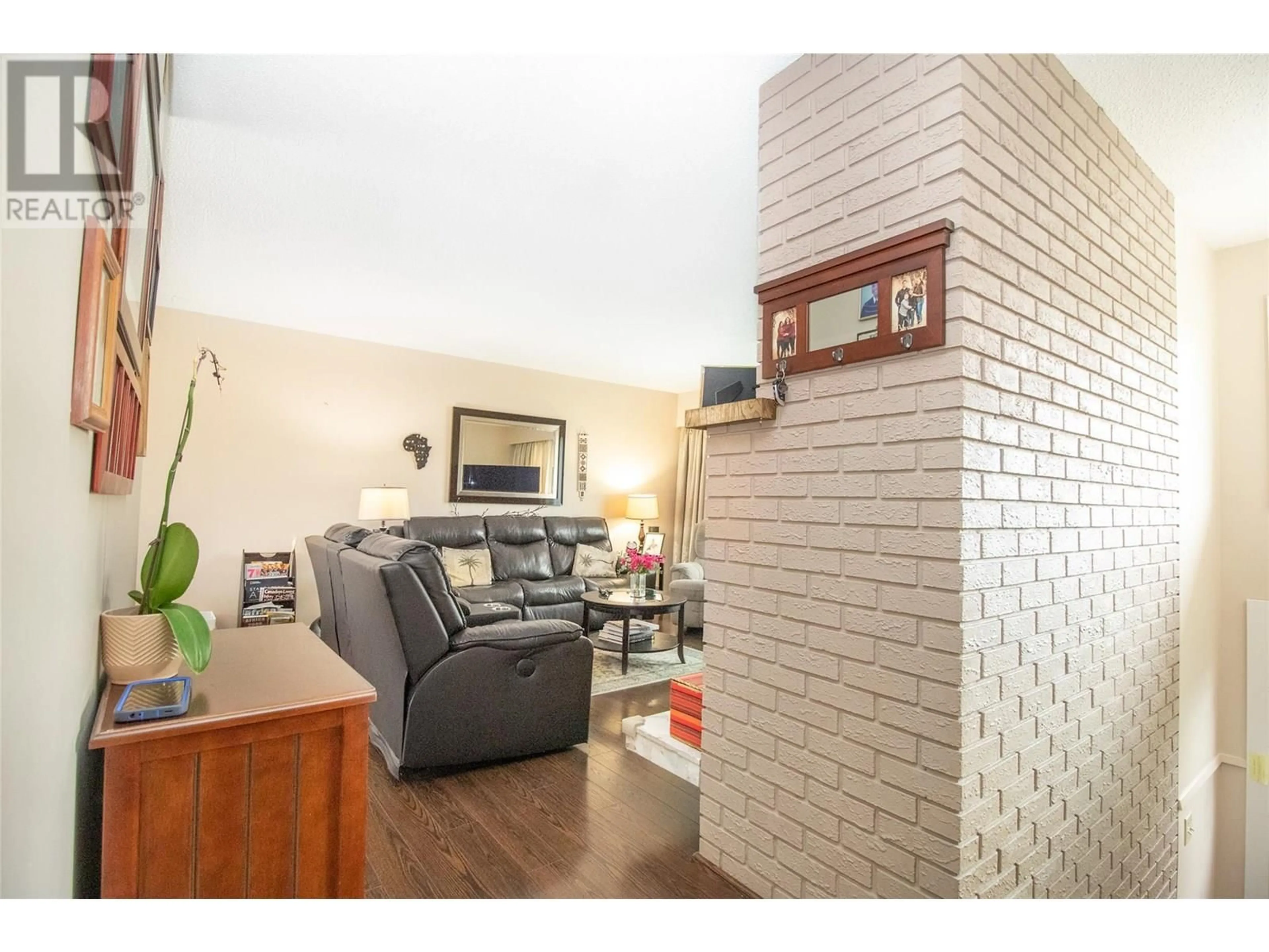 Living room with furniture, unknown for 710 TAMARACK DRIVE, Kelowna British Columbia V1X5L9
