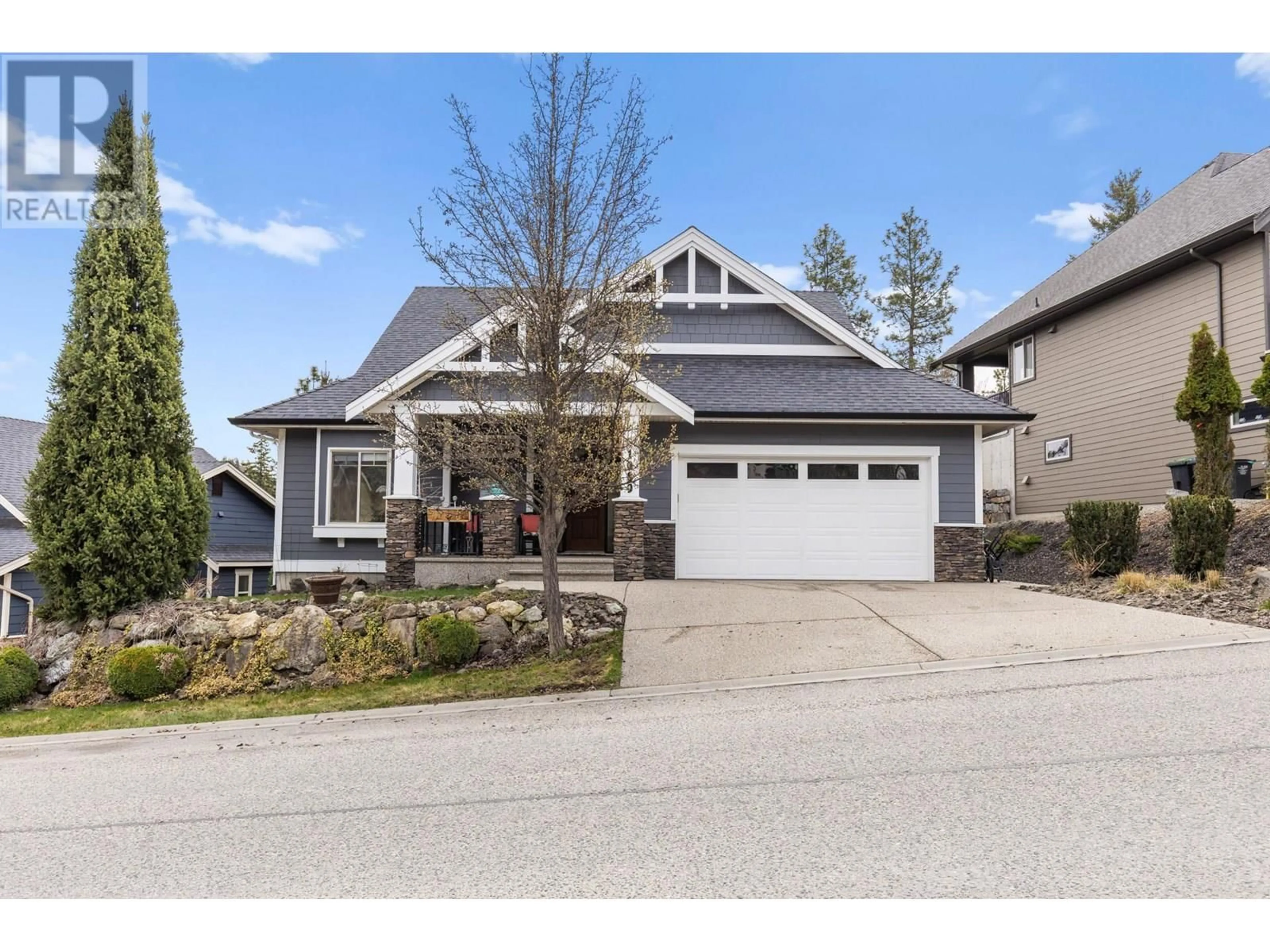 Home with vinyl exterior material, street for 1089 LONG RIDGE DRIVE, Kelowna British Columbia V1V2W9