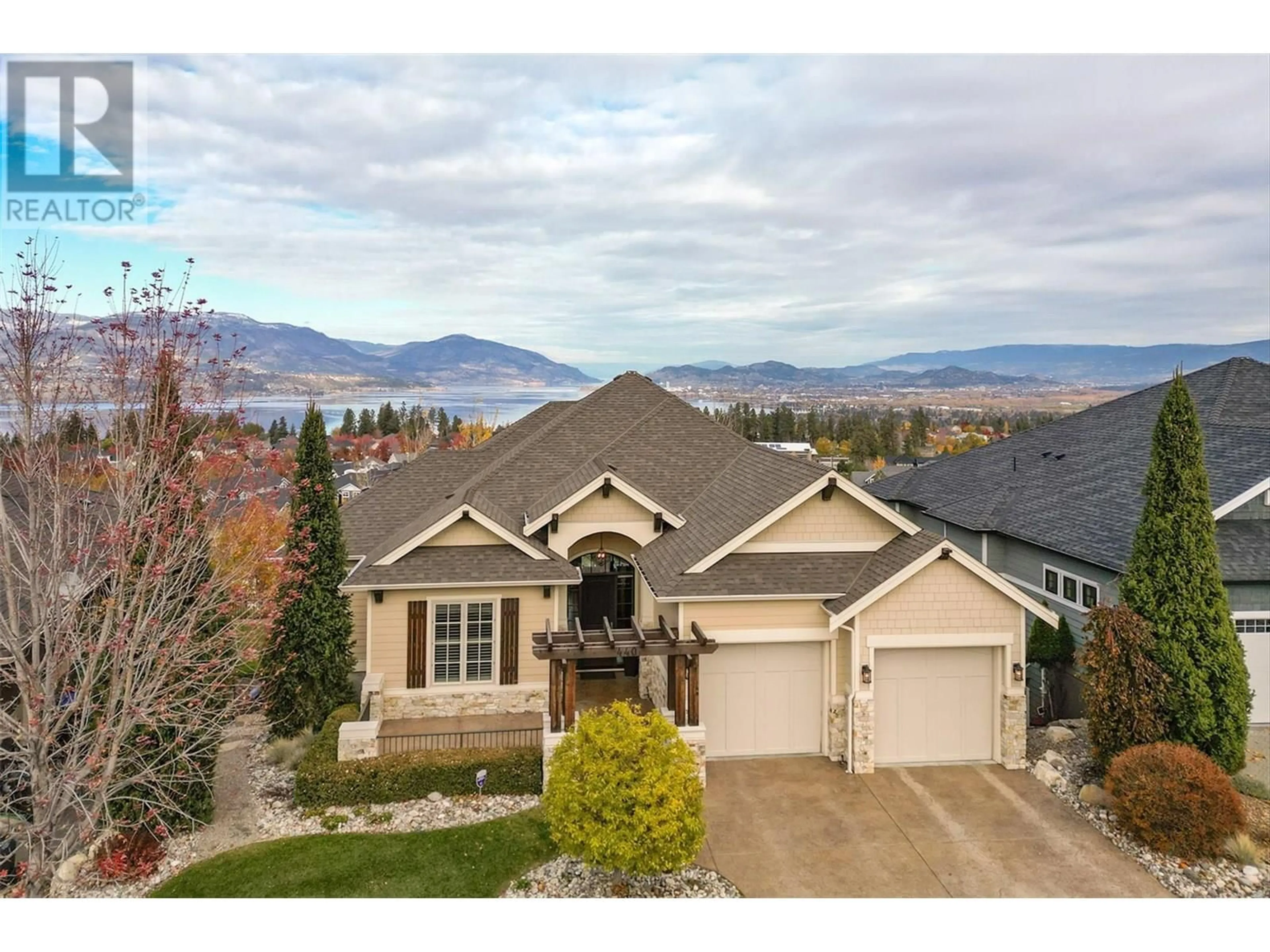 A pic from outside/outdoor area/front of a property/back of a property/a pic from drone, mountain view for 440 LAKEPOINTE DRIVE, Kelowna British Columbia V1W5K2