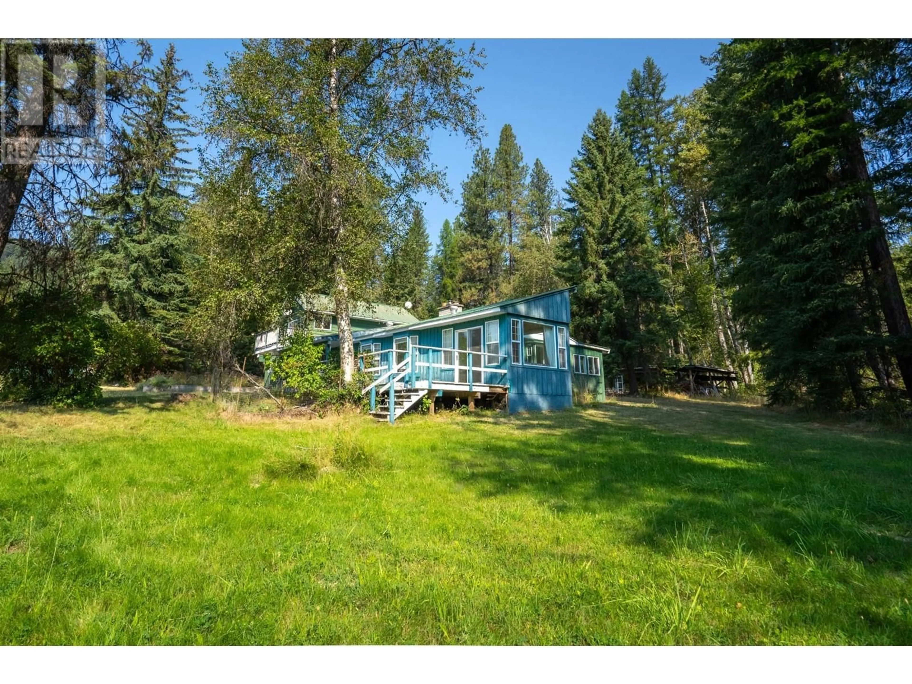 A pic from outside/outdoor area/front of a property/back of a property/a pic from drone, forest/trees view for 2350 FIFE ROAD, Christina Lake British Columbia V0H1E3