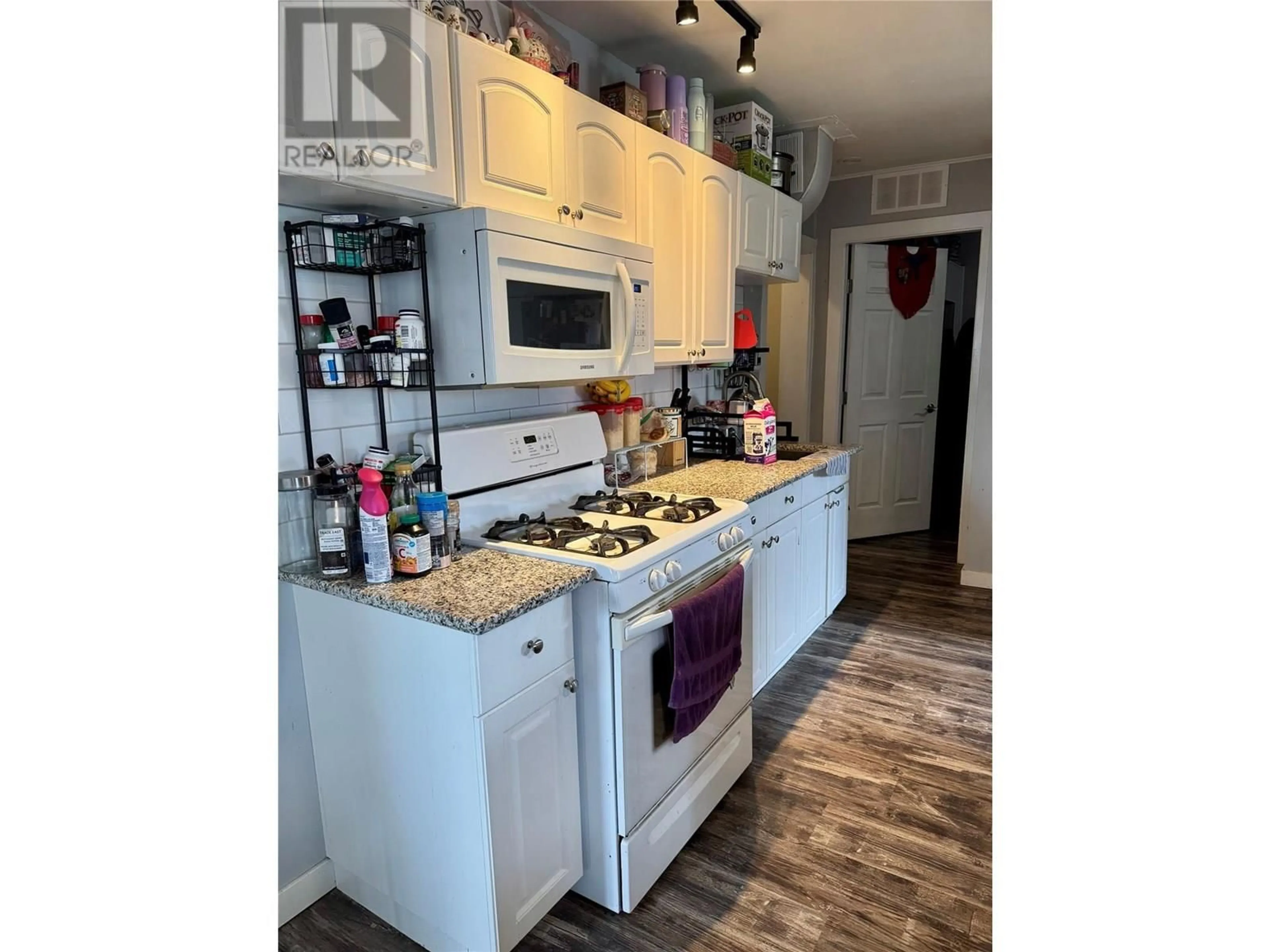Standard kitchen, wood/laminate floor for 2276 COUTLEE AVENUE, Merritt British Columbia V1K1R6
