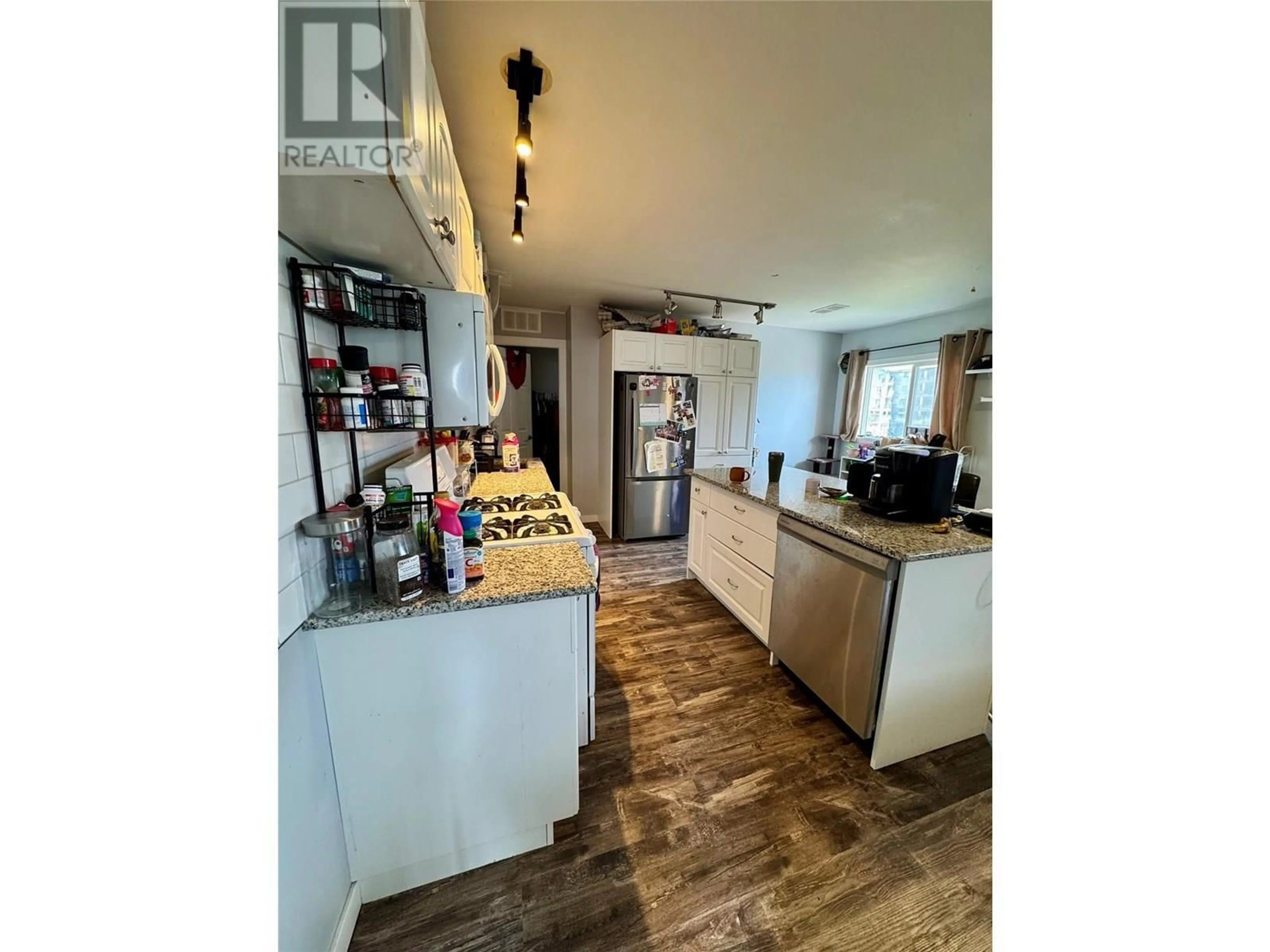 Open concept kitchen, unknown for 2276 COUTLEE AVENUE, Merritt British Columbia V1K1R6