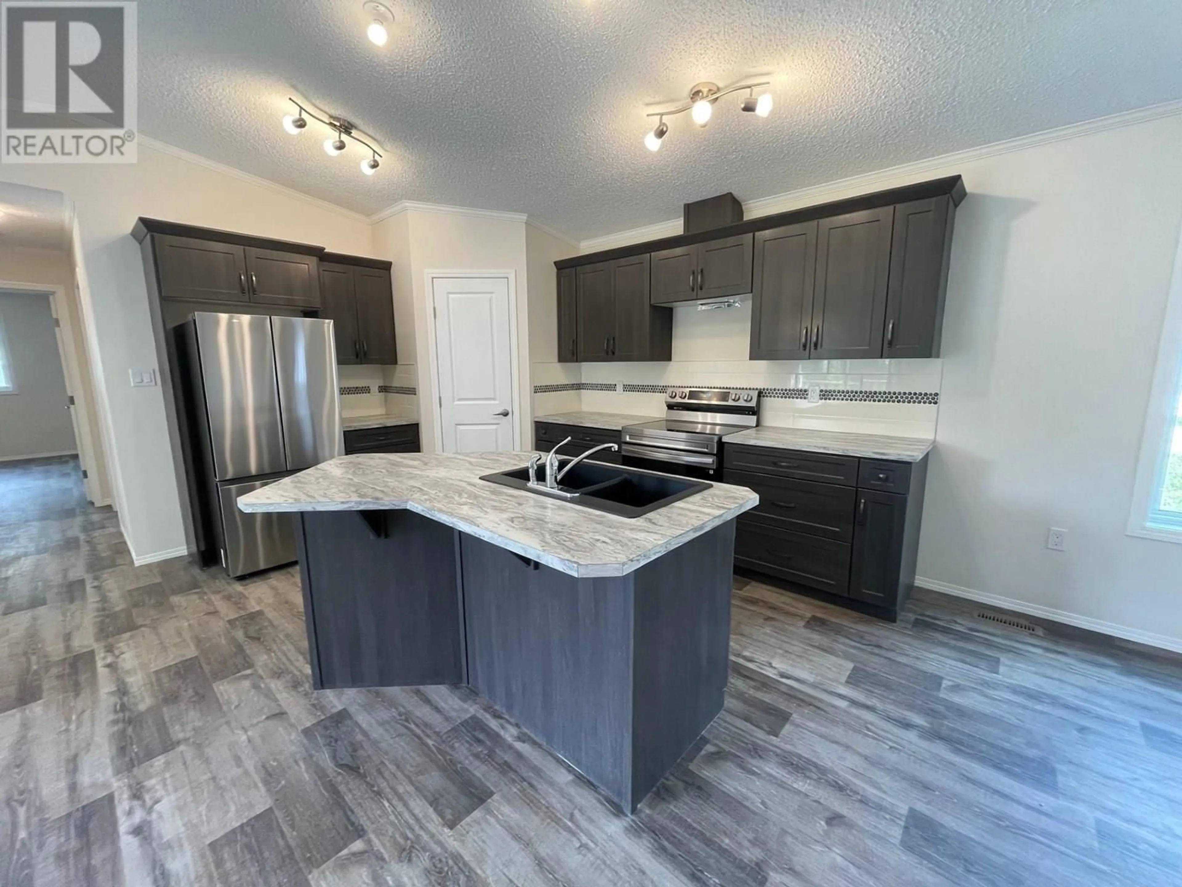 Open concept kitchen, unknown for 41 - 9773 STEPHENSON ROAD, Fernie British Columbia V0B1M5