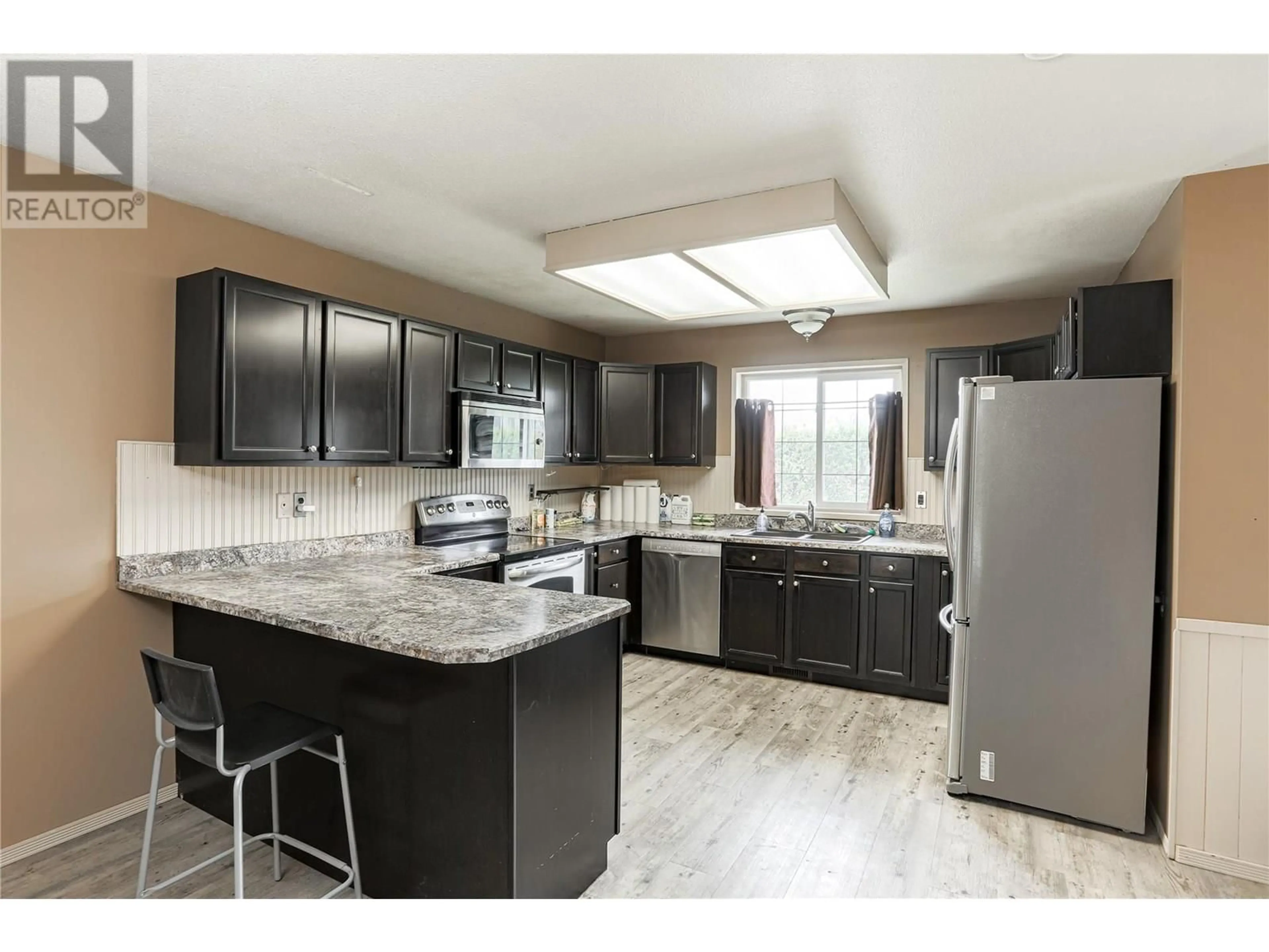 Open concept kitchen, unknown for 785 CLEMENT AVENUE, Kelowna British Columbia V1Y7C9