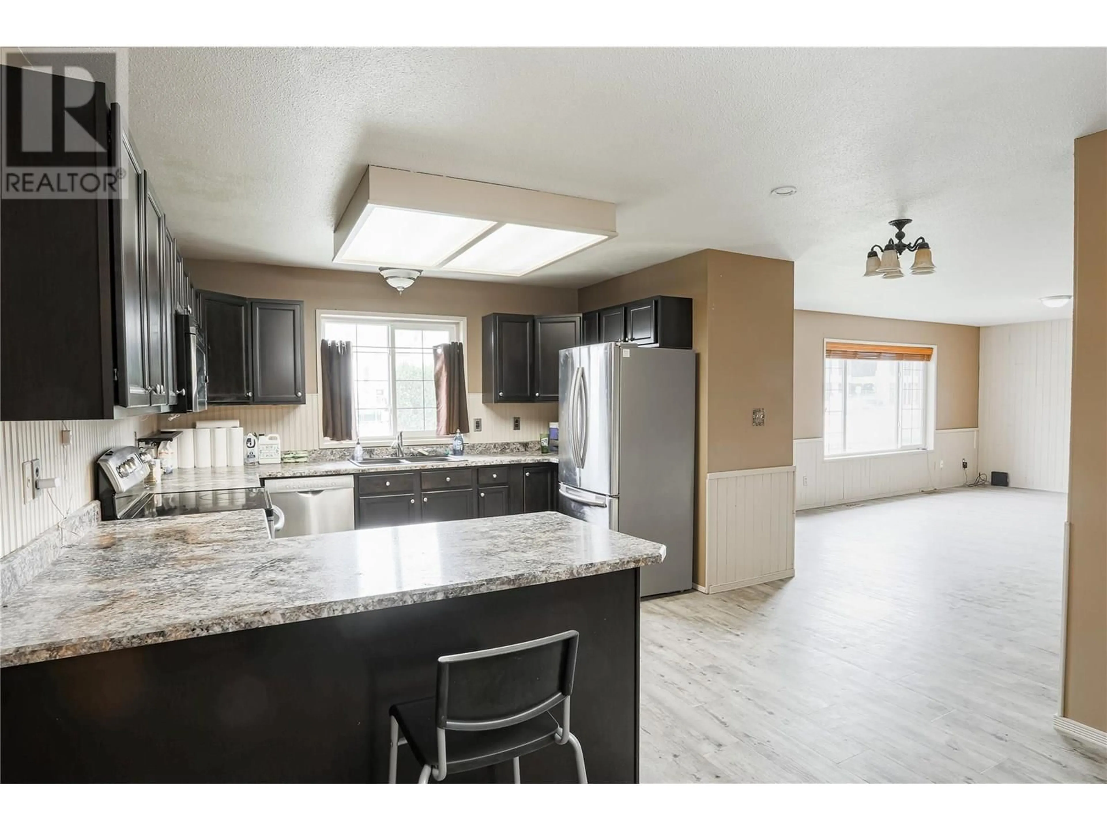 Open concept kitchen, ceramic/tile floor for 785 CLEMENT AVENUE, Kelowna British Columbia V1Y7C9