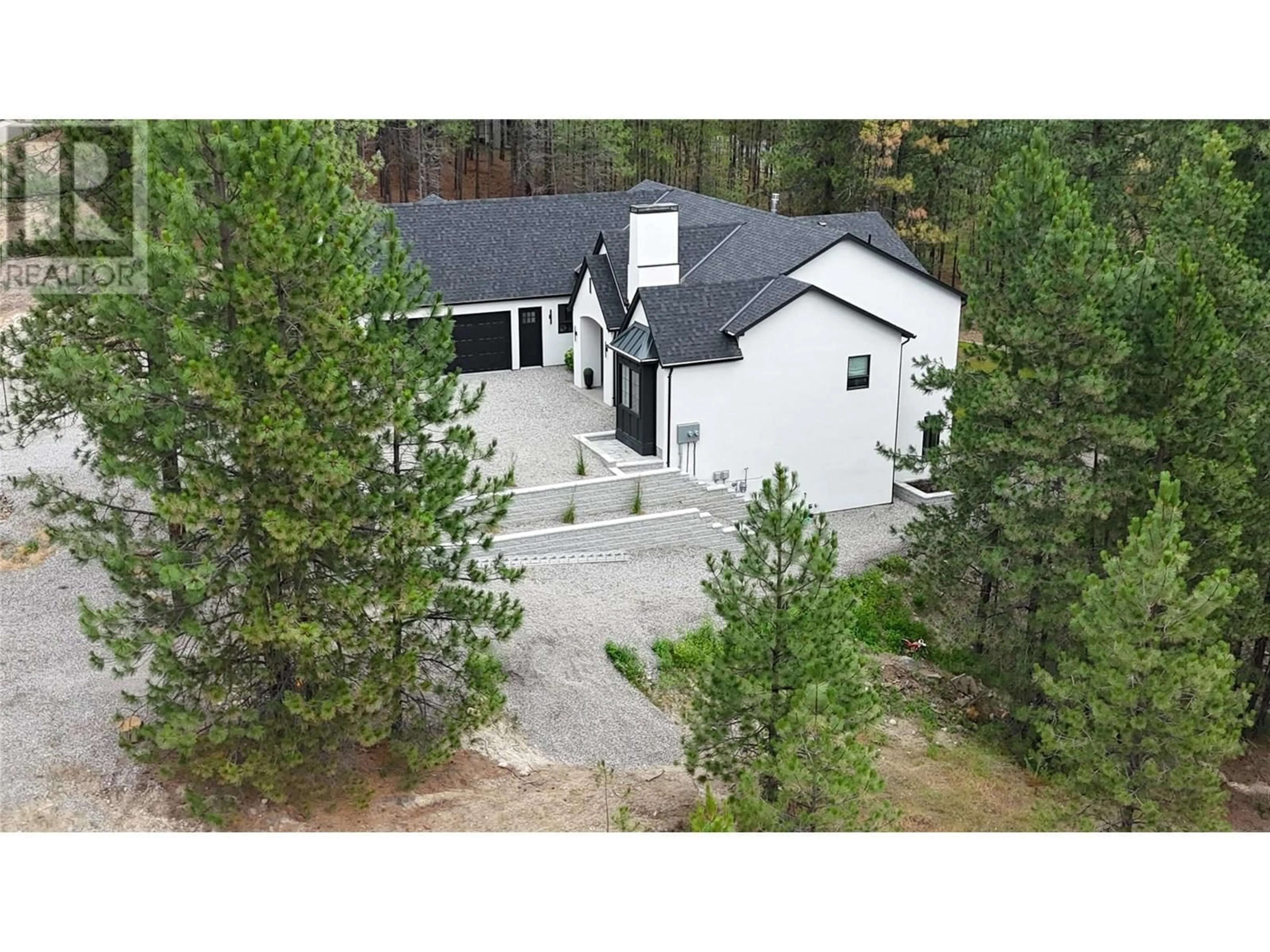 A pic from outside/outdoor area/front of a property/back of a property/a pic from drone, forest/trees view for 2690 PLACER PLACE, Grand Forks British Columbia V0H1H2