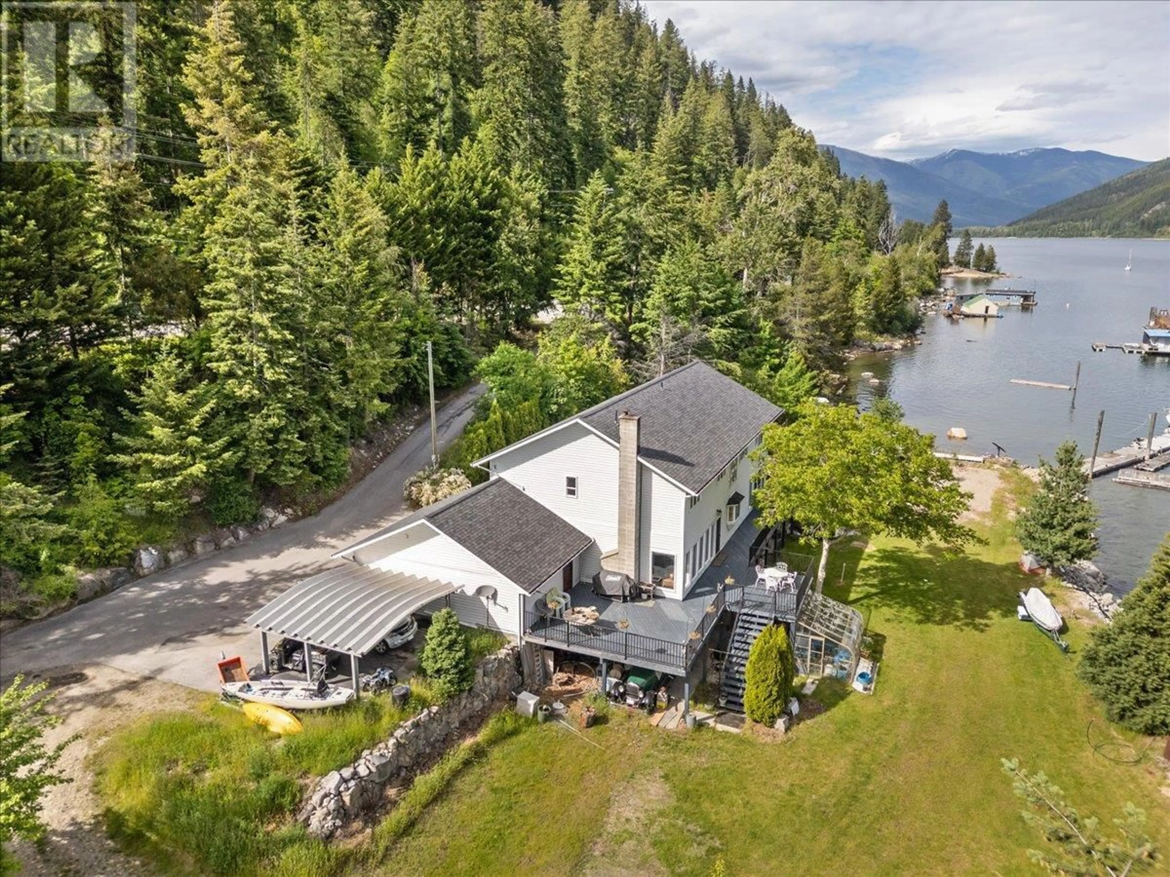 A pic from outside/outdoor area/front of a property/back of a property/a pic from drone, water/lake/river/ocean view for 1089, 1090 3A HIGHWAY, Nelson British Columbia V1L6J5