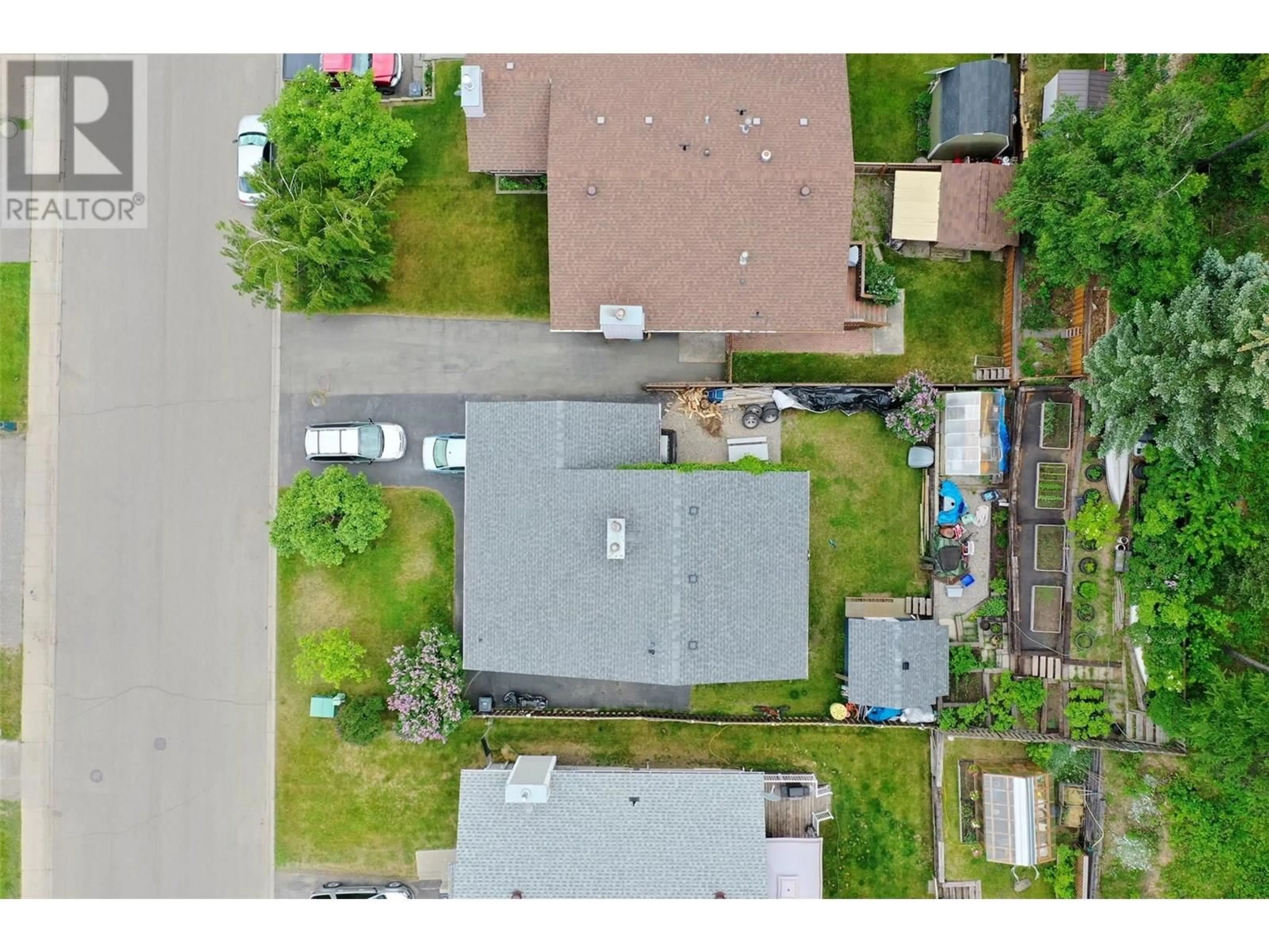 A pic from outside/outdoor area/front of a property/back of a property/a pic from drone, street for 1227 PINYON ROAD, Sparwood British Columbia V0B2G2
