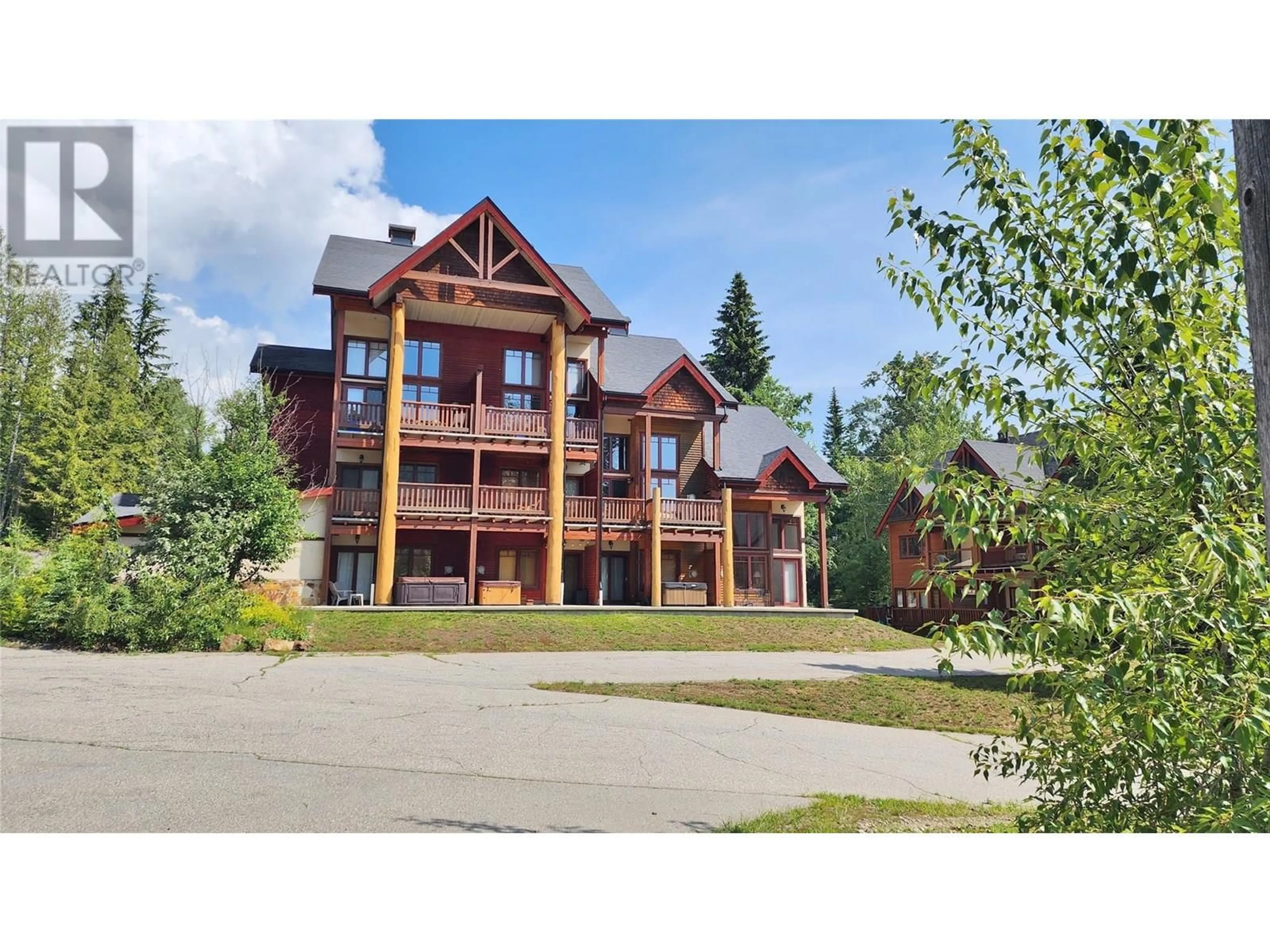 A pic from outside/outdoor area/front of a property/back of a property/a pic from drone, building for 3A - 1080 OLAUS WAY, Rossland British Columbia V0G1Y0
