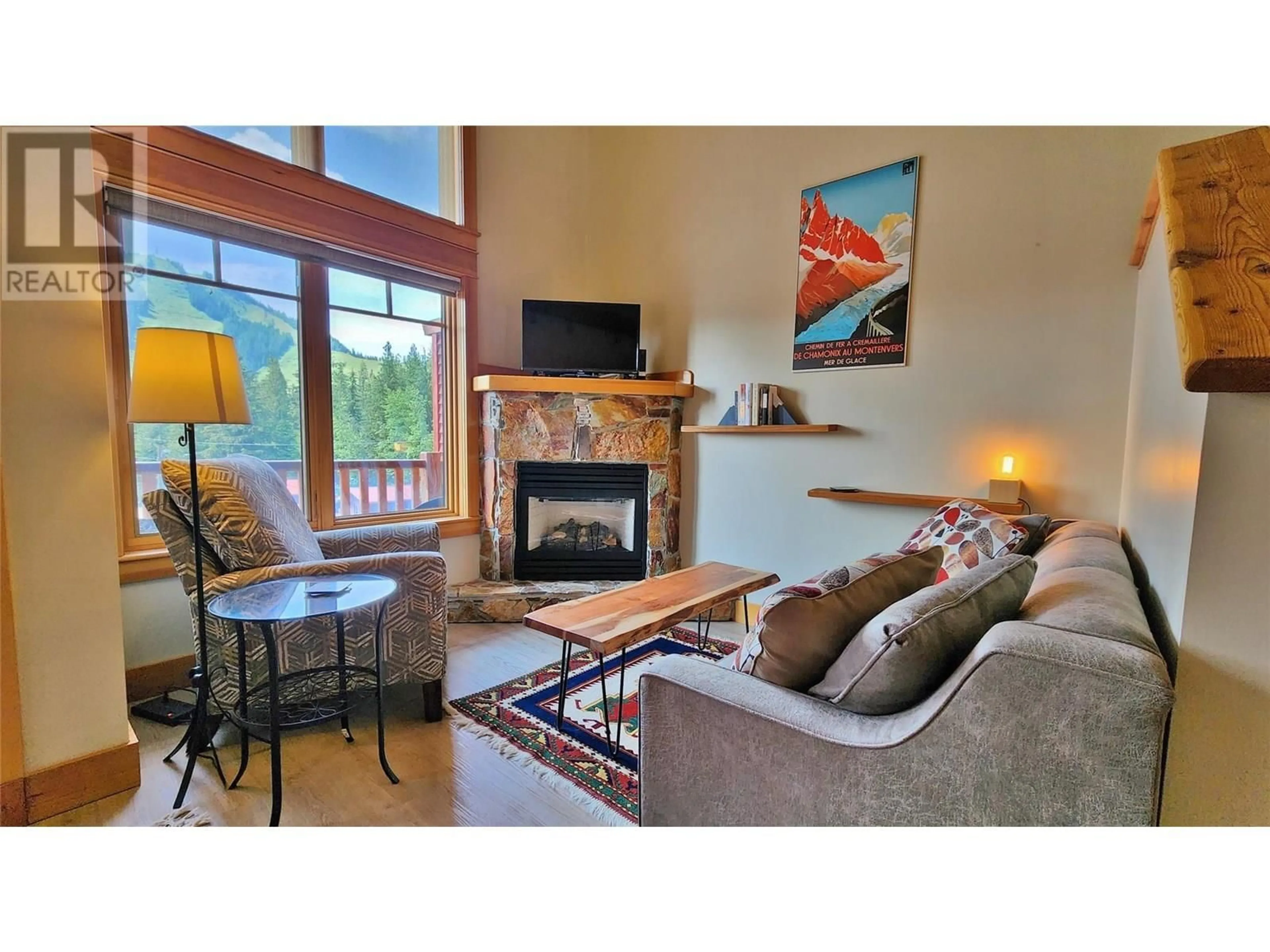 Living room with furniture, unknown for 3A - 1080 OLAUS WAY, Rossland British Columbia V0G1Y0