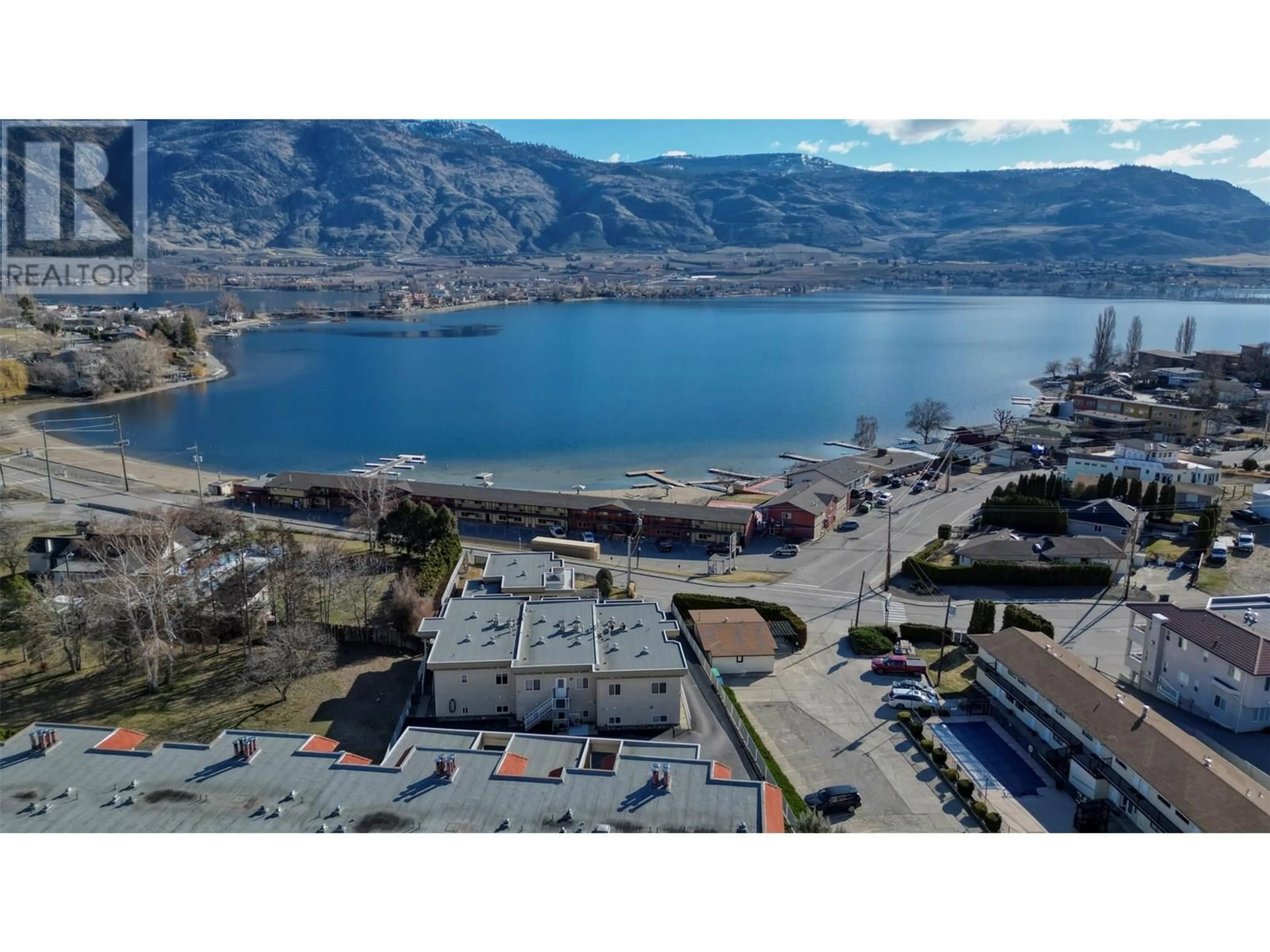 A pic from outside/outdoor area/front of a property/back of a property/a pic from drone, mountain view for 2 - 6006 89TH STREET, Osoyoos British Columbia V0H1V1